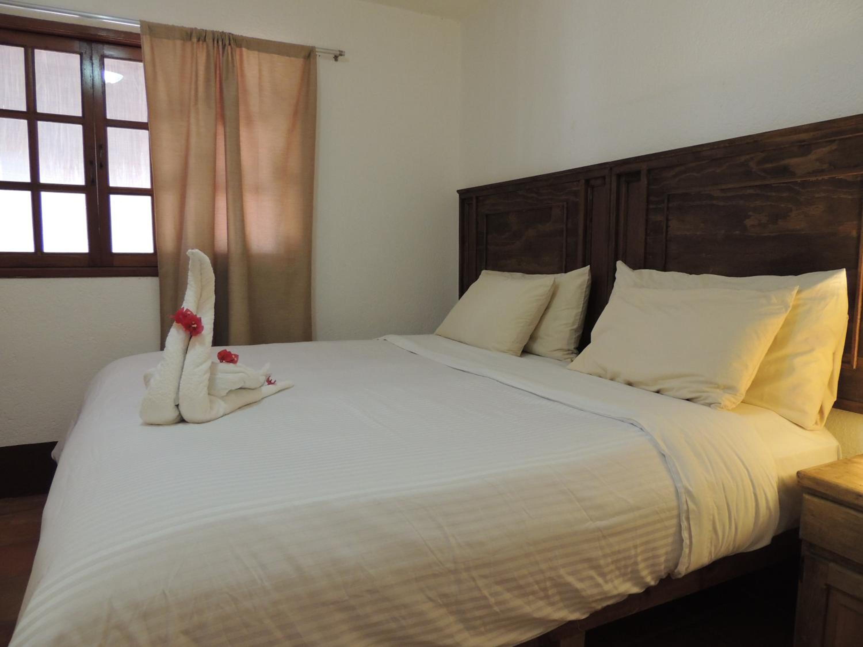 Economy Quadruple Room - Photo 17