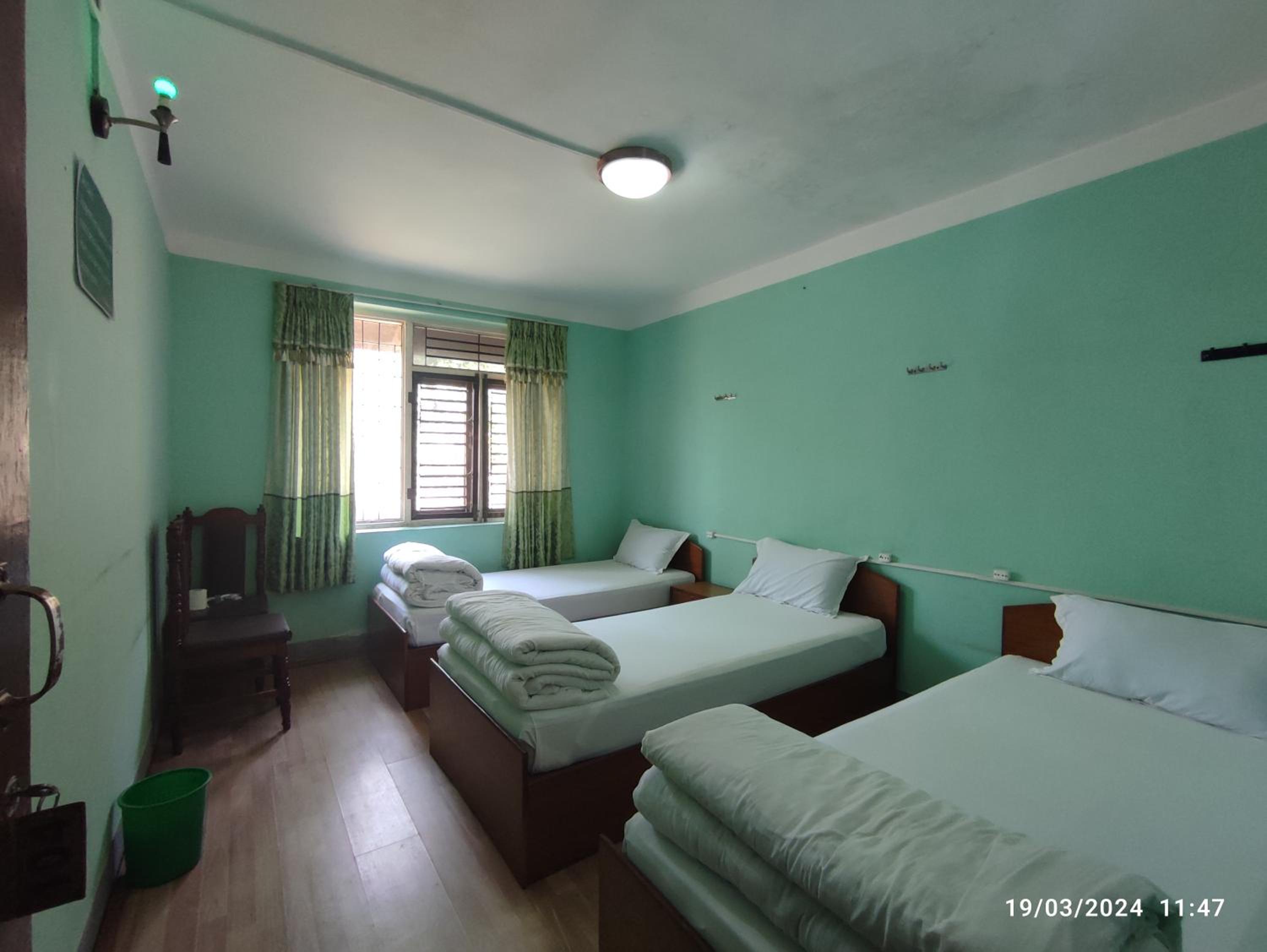 Basic Triple Room with Shared Bathroom