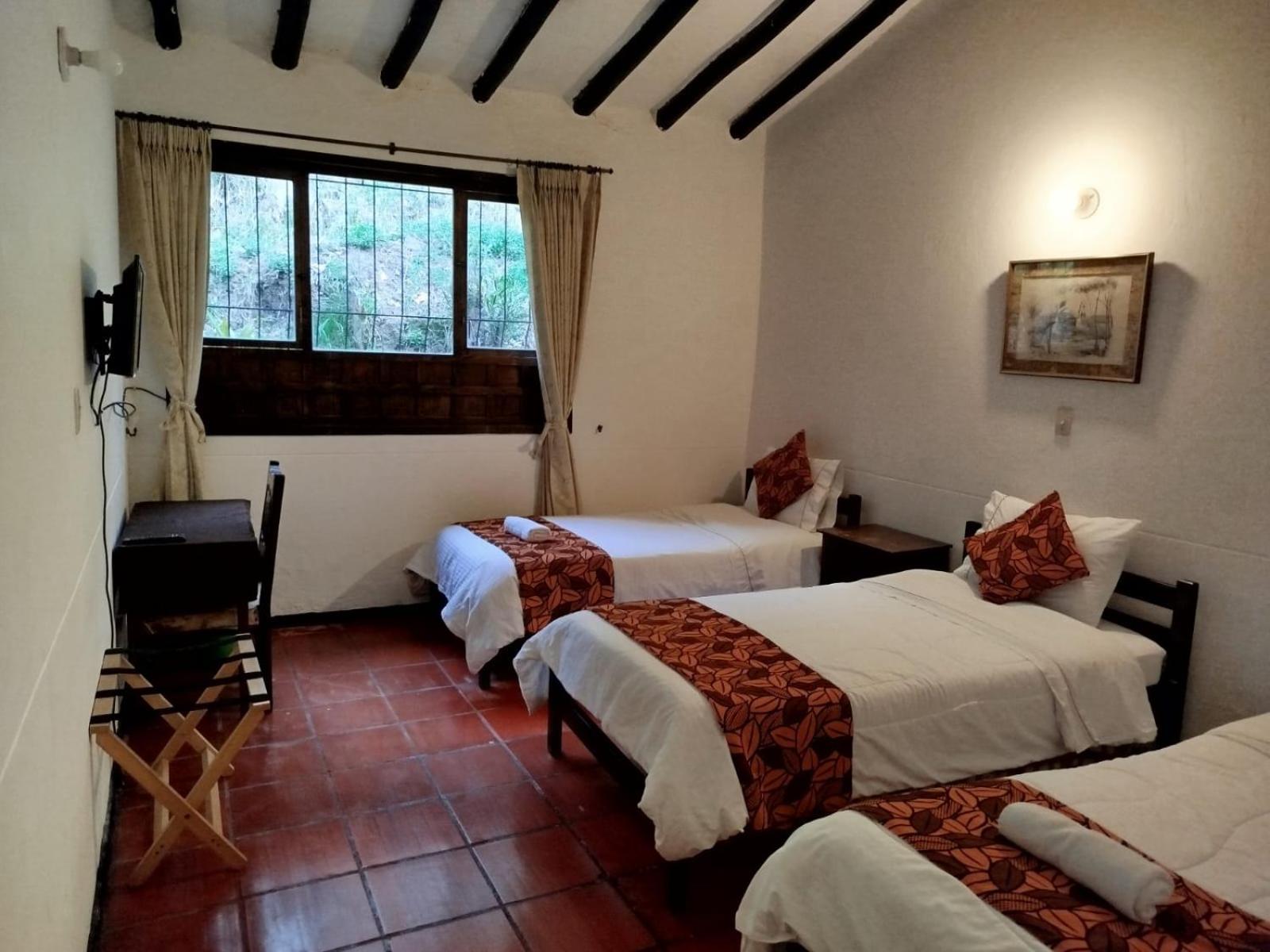 Quadruple Room with Private Bathroom