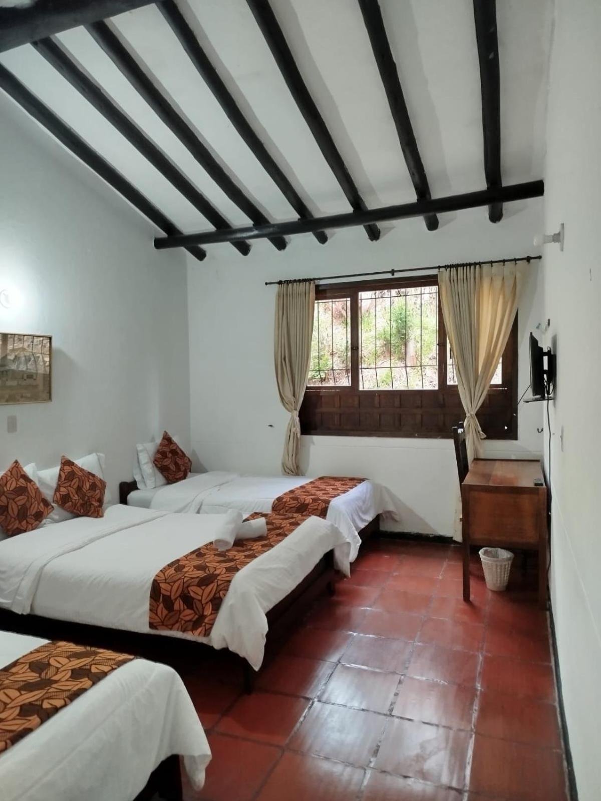 Quadruple Room with Private Bathroom