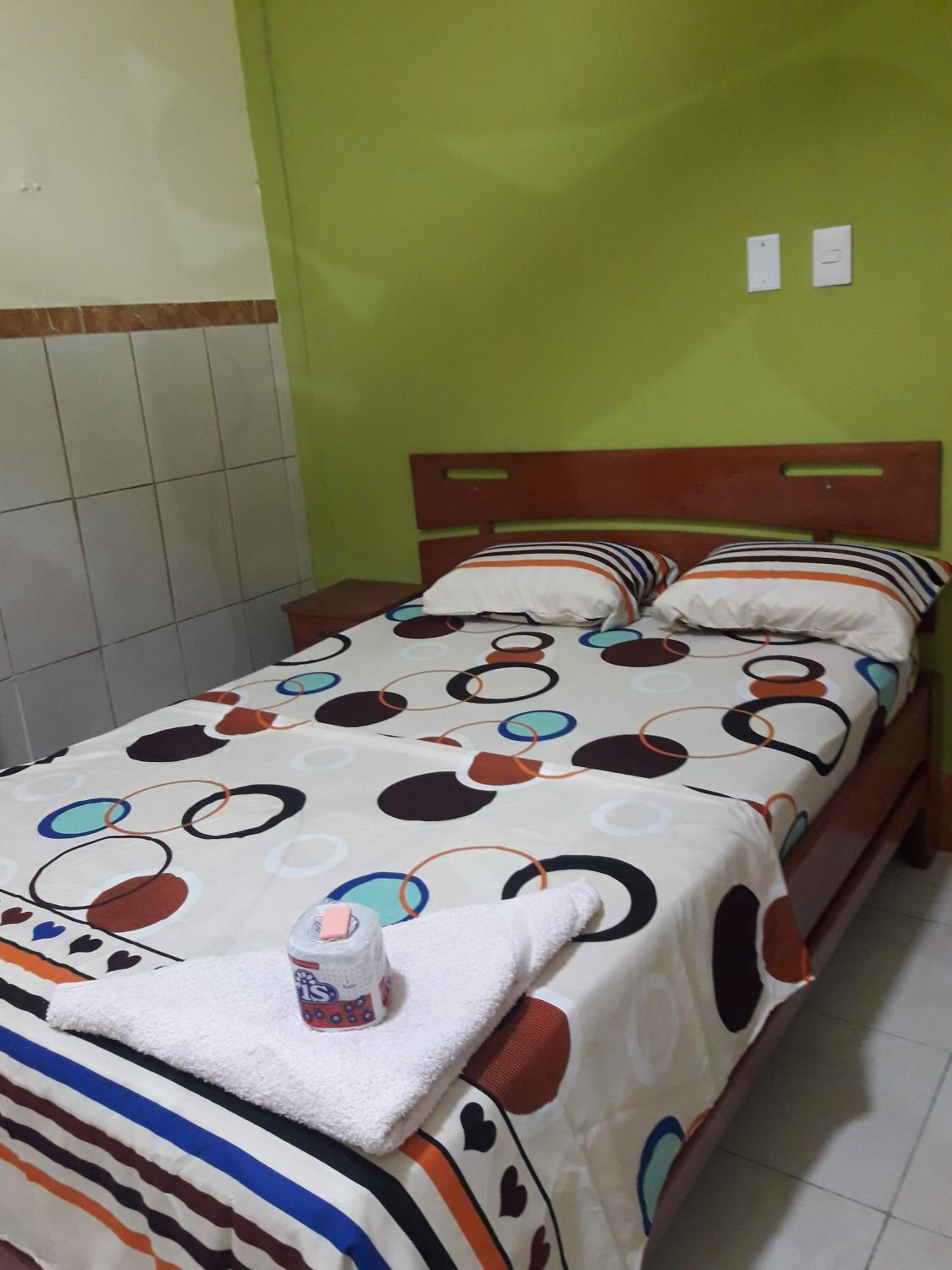 Single Bed In Dormitory Room