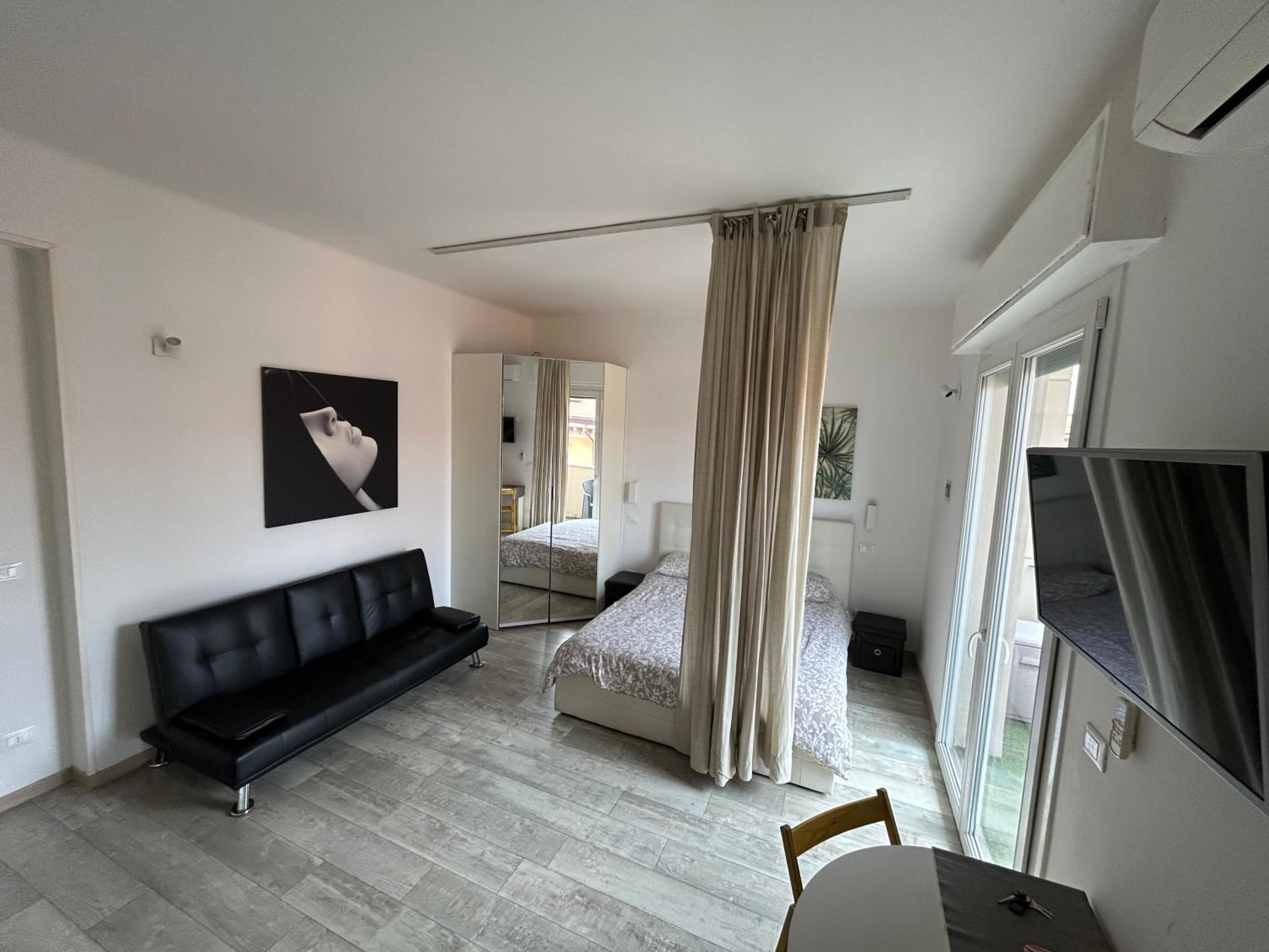 King Studio with Sofa Bed and Balcony