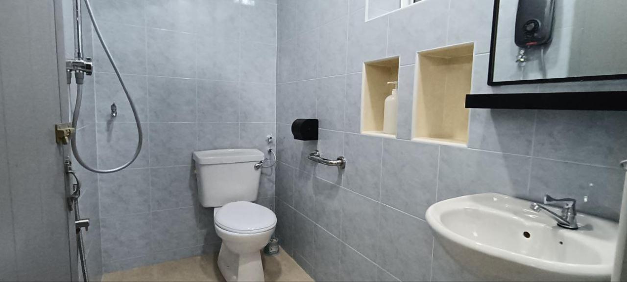 Three-Bedroom House - Photo 31
