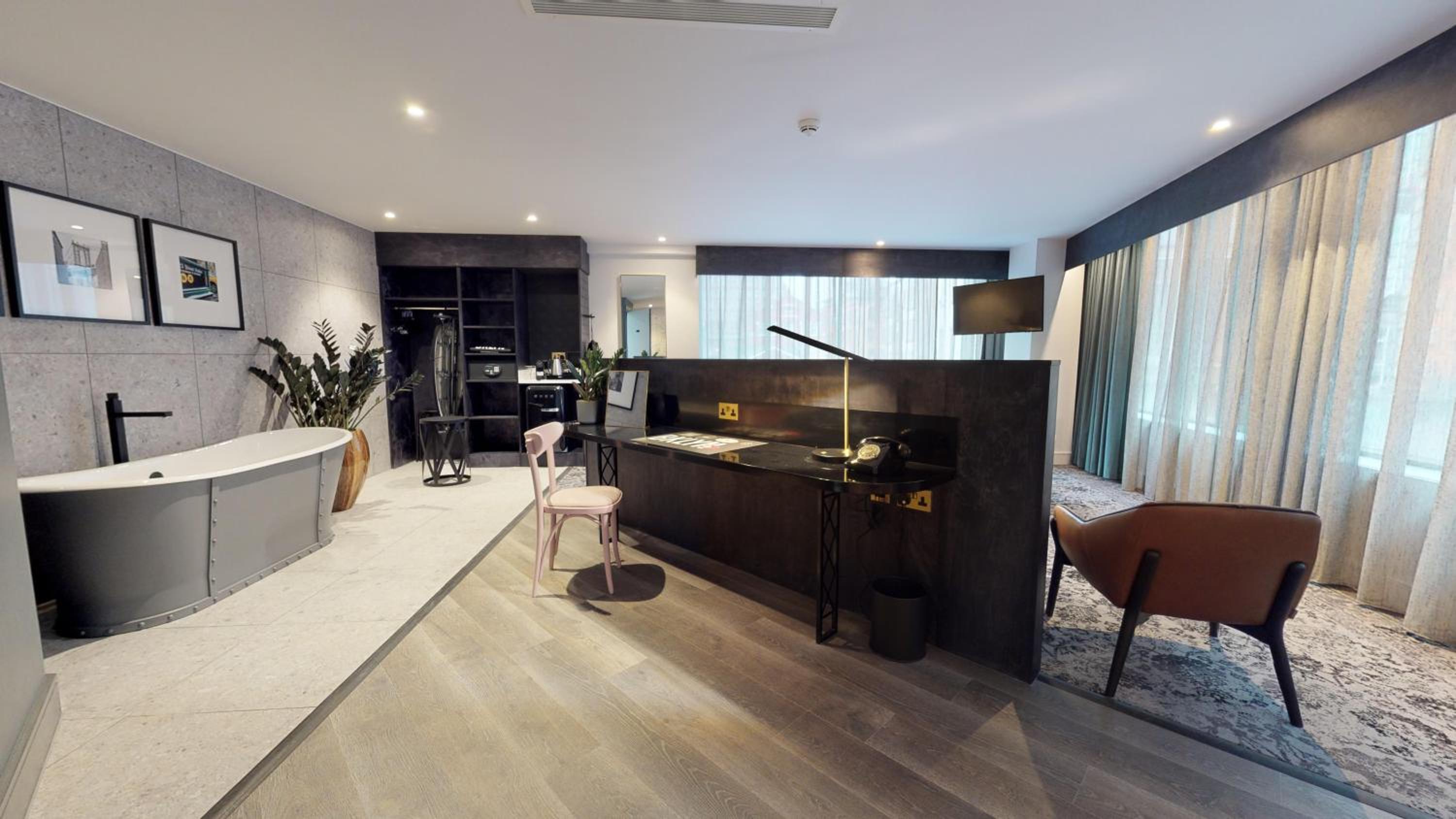 King Suite with Bath and Sofa Bed - Photo 9