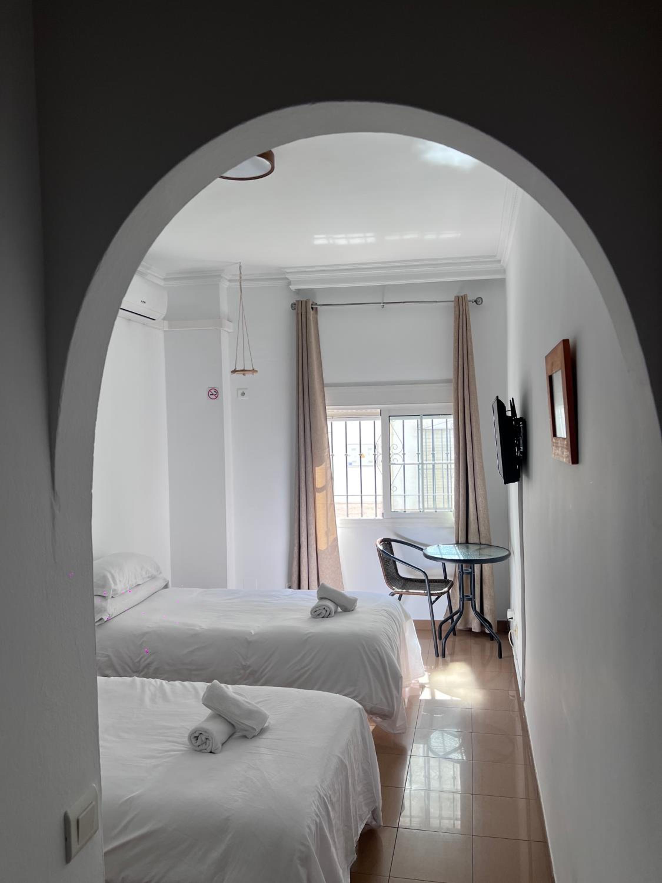 Habitación Doble con Dos Camas Dobles
