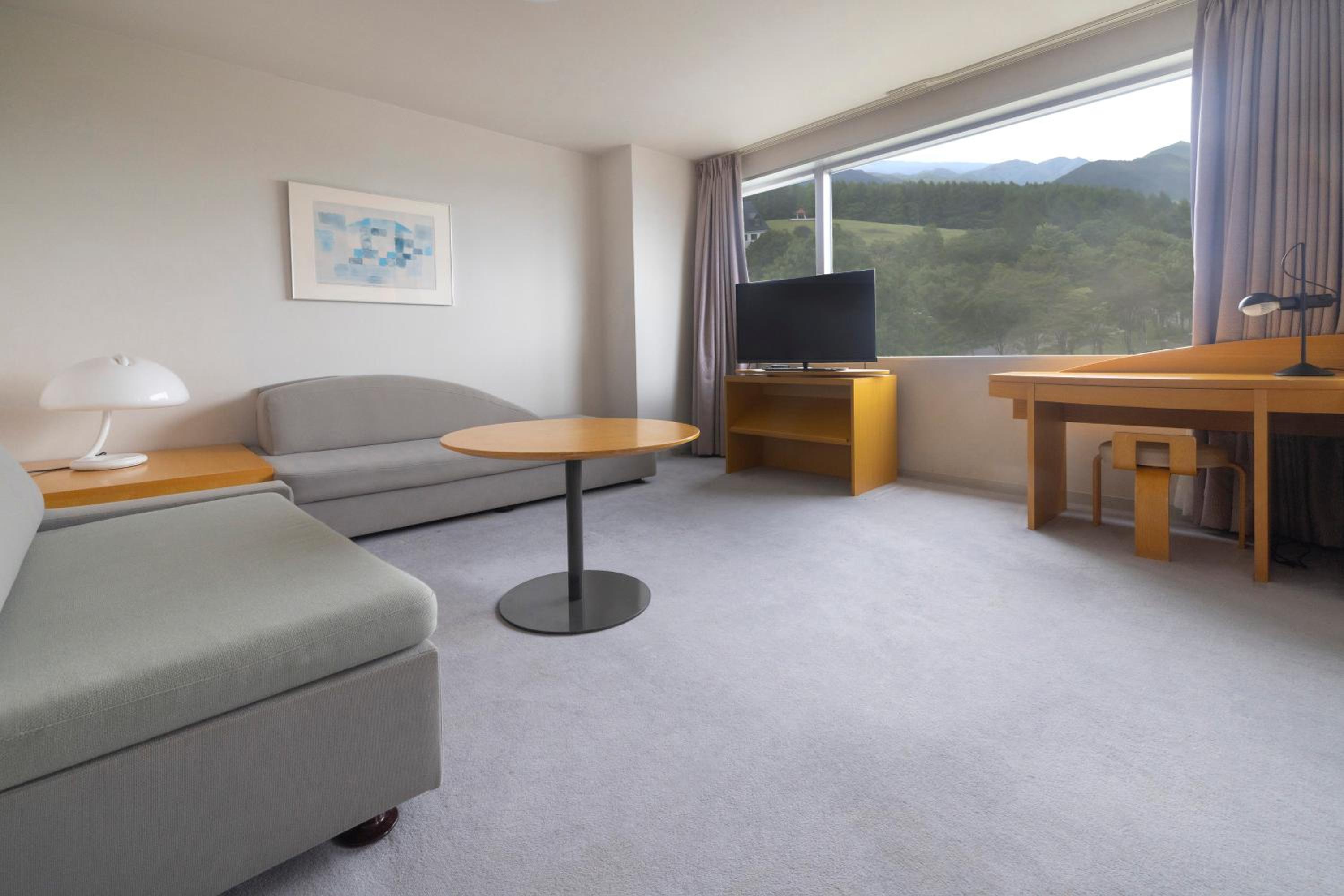 Premium Room with Three Single Beds and Two Single Sofa Beds - Photo 2