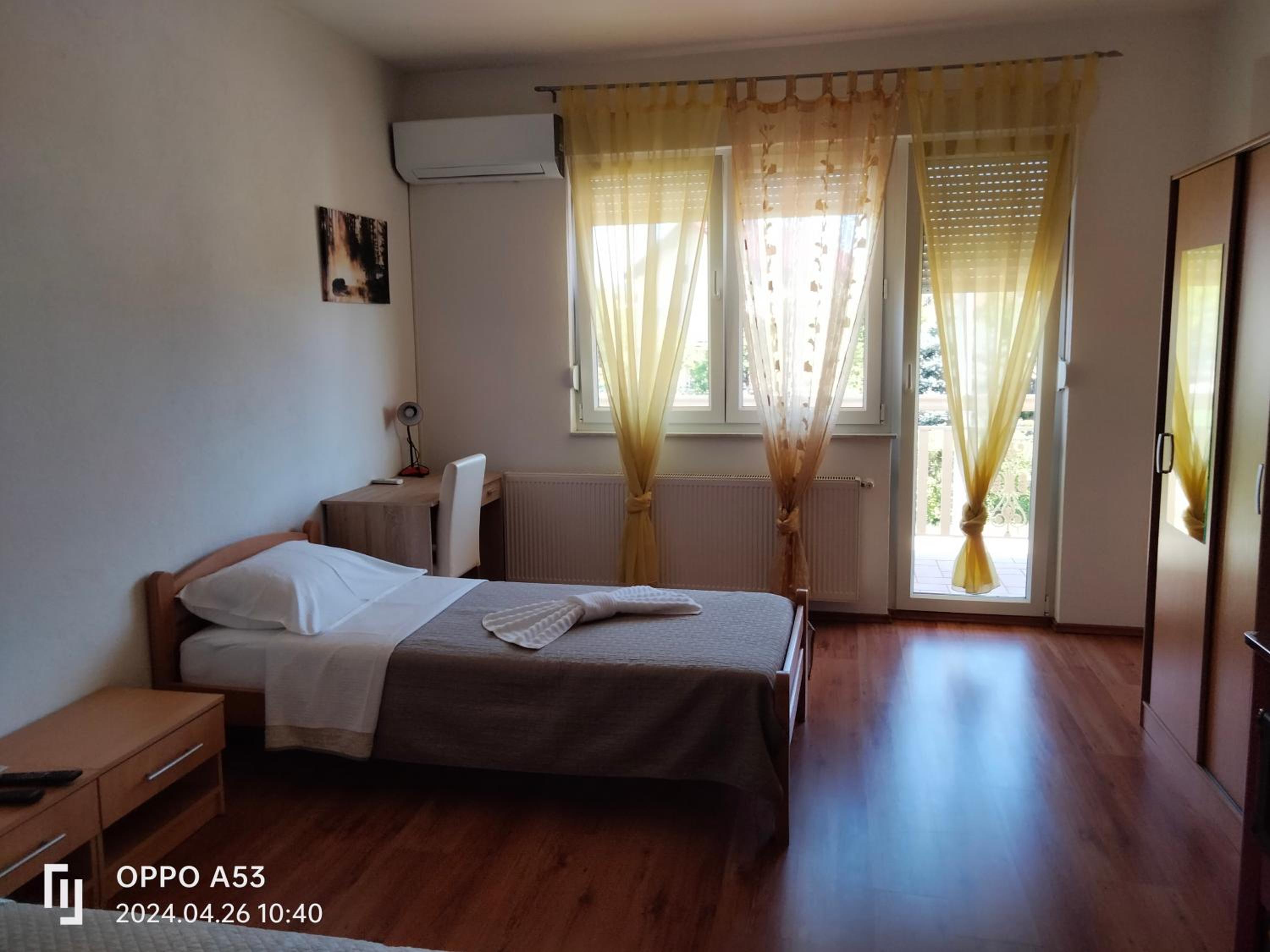 Three-Bedroom Apartment photo 1