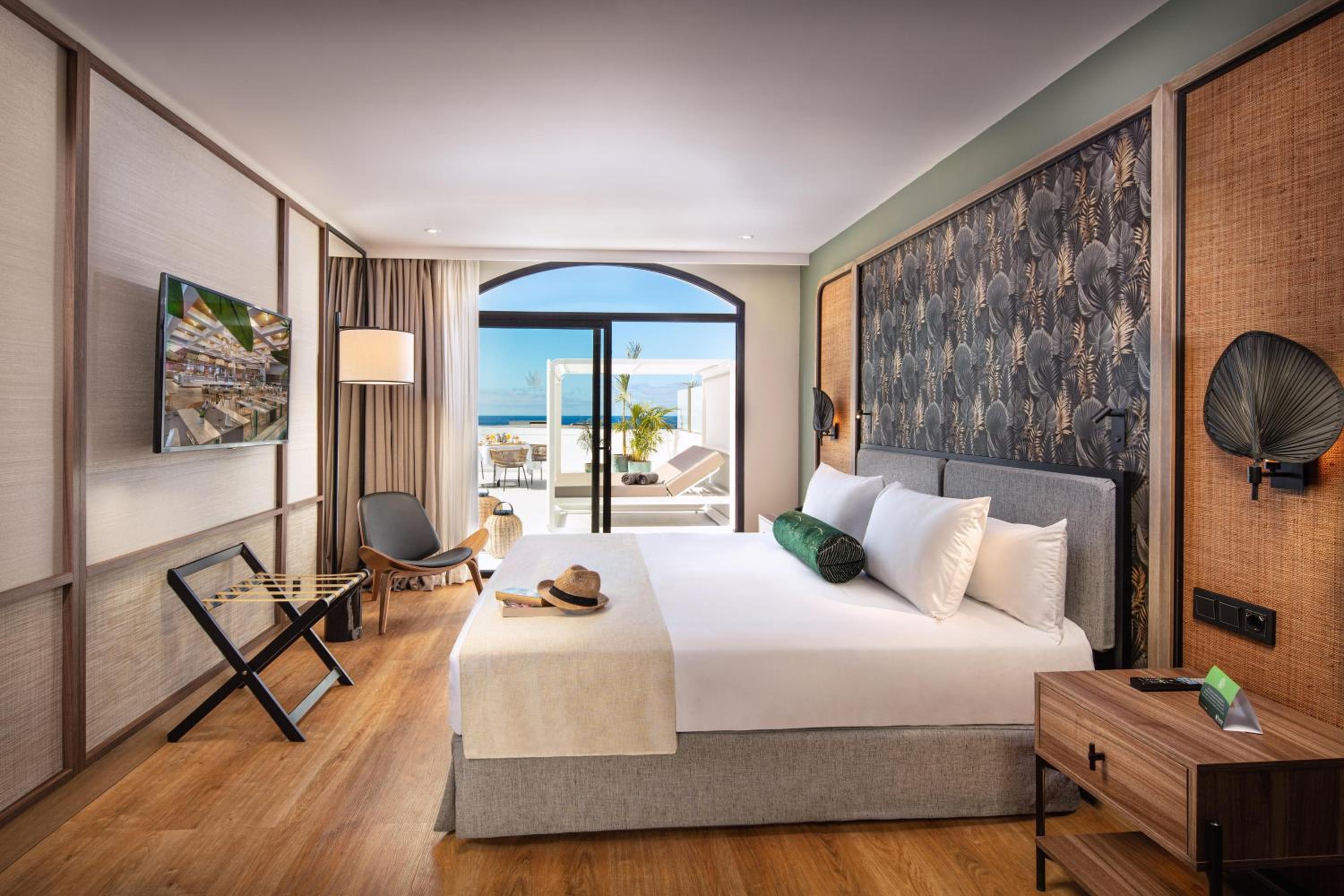 Ocean or Pool View Suite with Terrace, Balinese Bed, and Jacuzzi