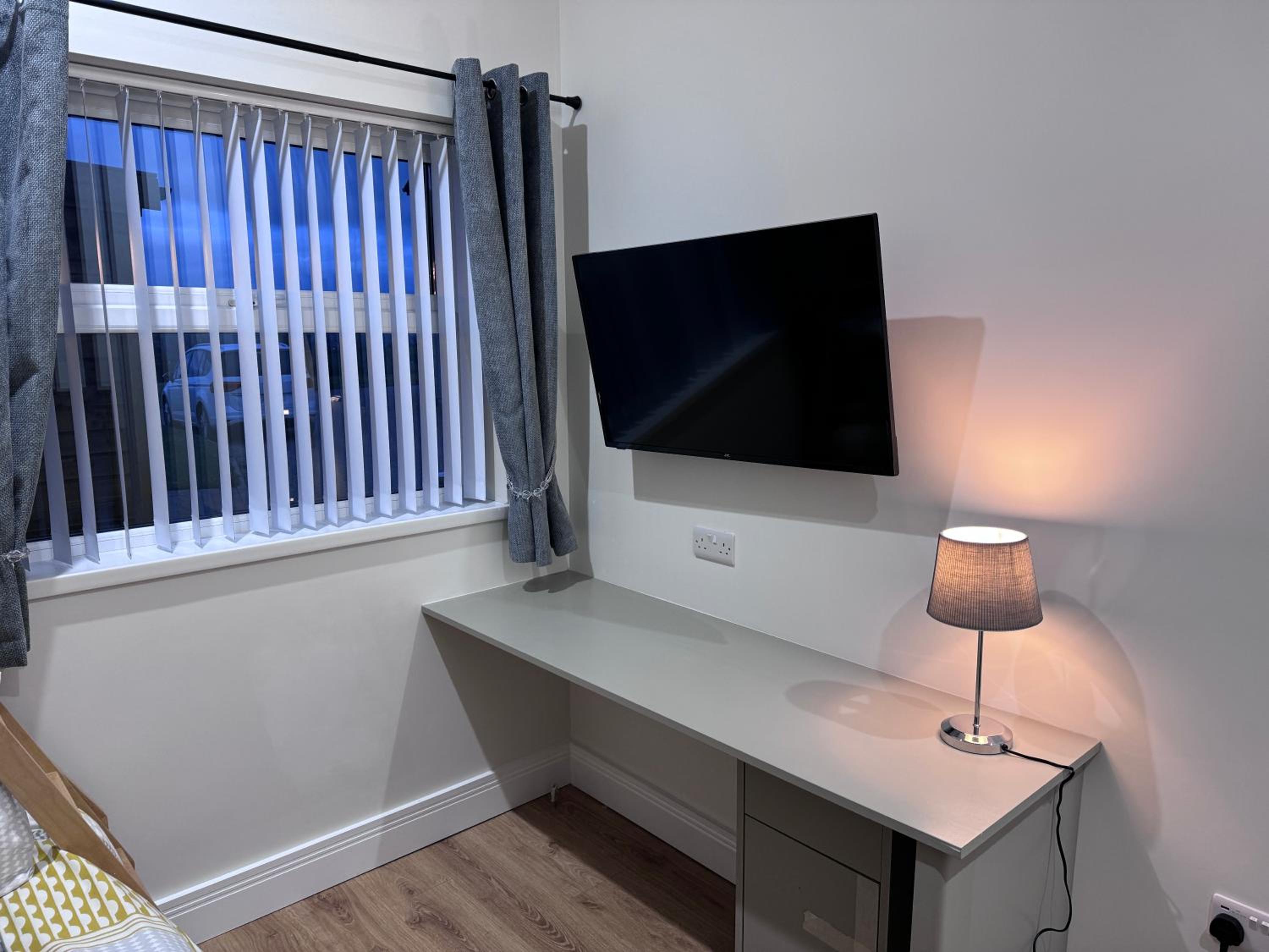 Three-Bedroom Apartment photo 2