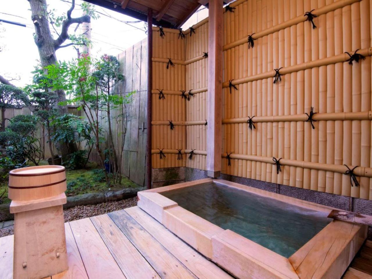 Japanese-Style Quadruple Room with Garden View with Open-Air Bath photo 2