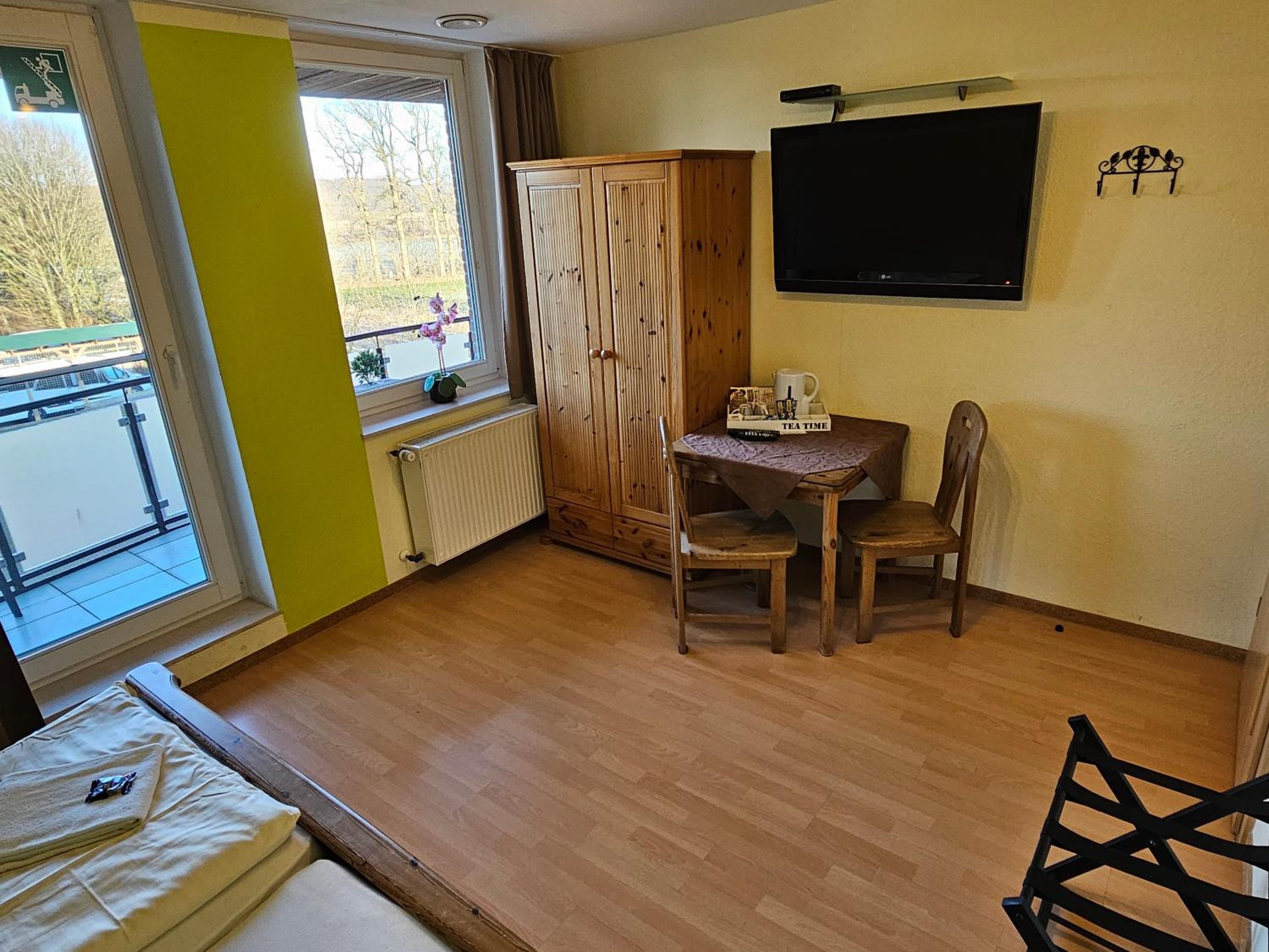 Family Room with Balcony - Photo 8