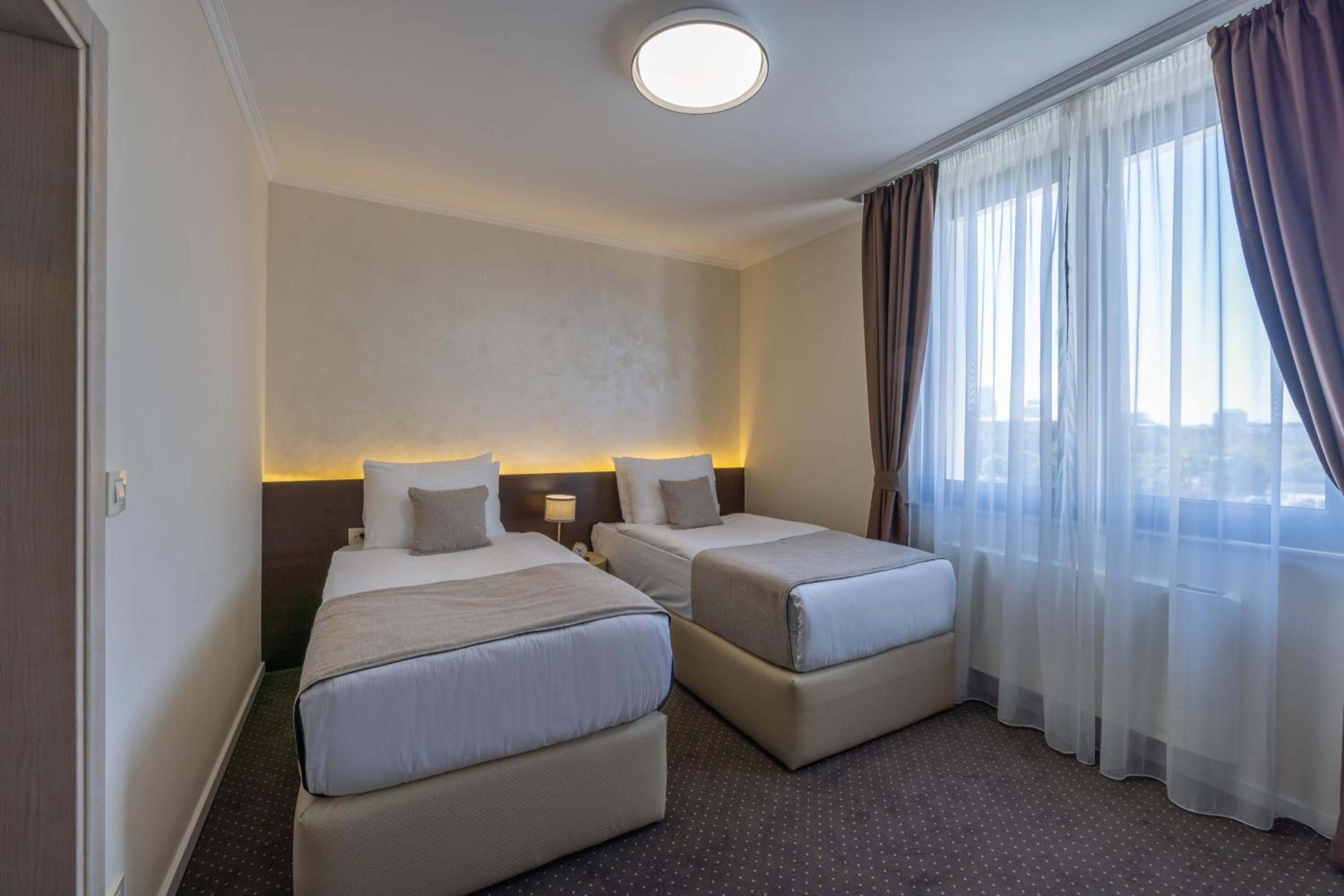 Twin Room - Photo 1