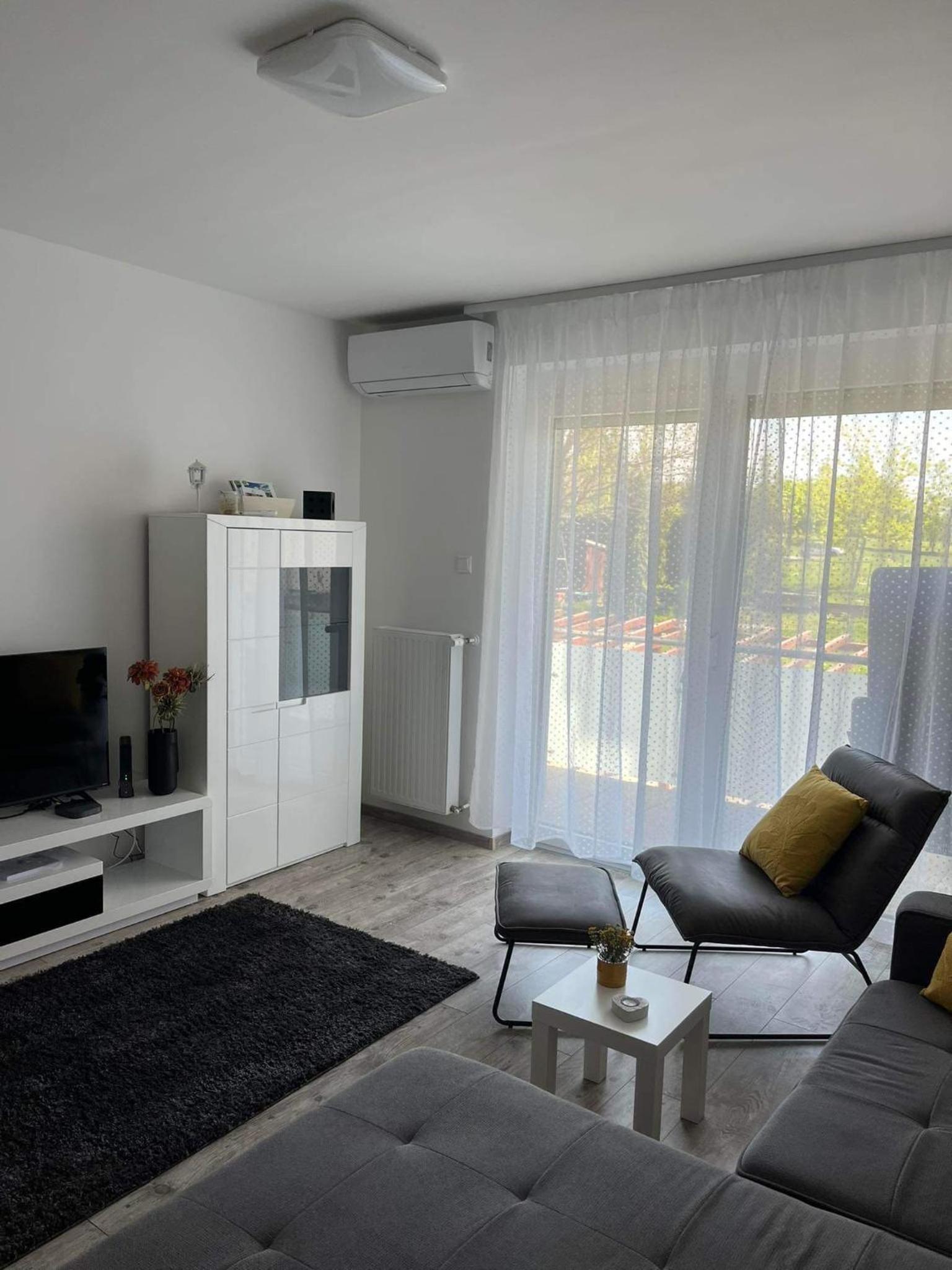 Three-Bedroom Apartment photo 1