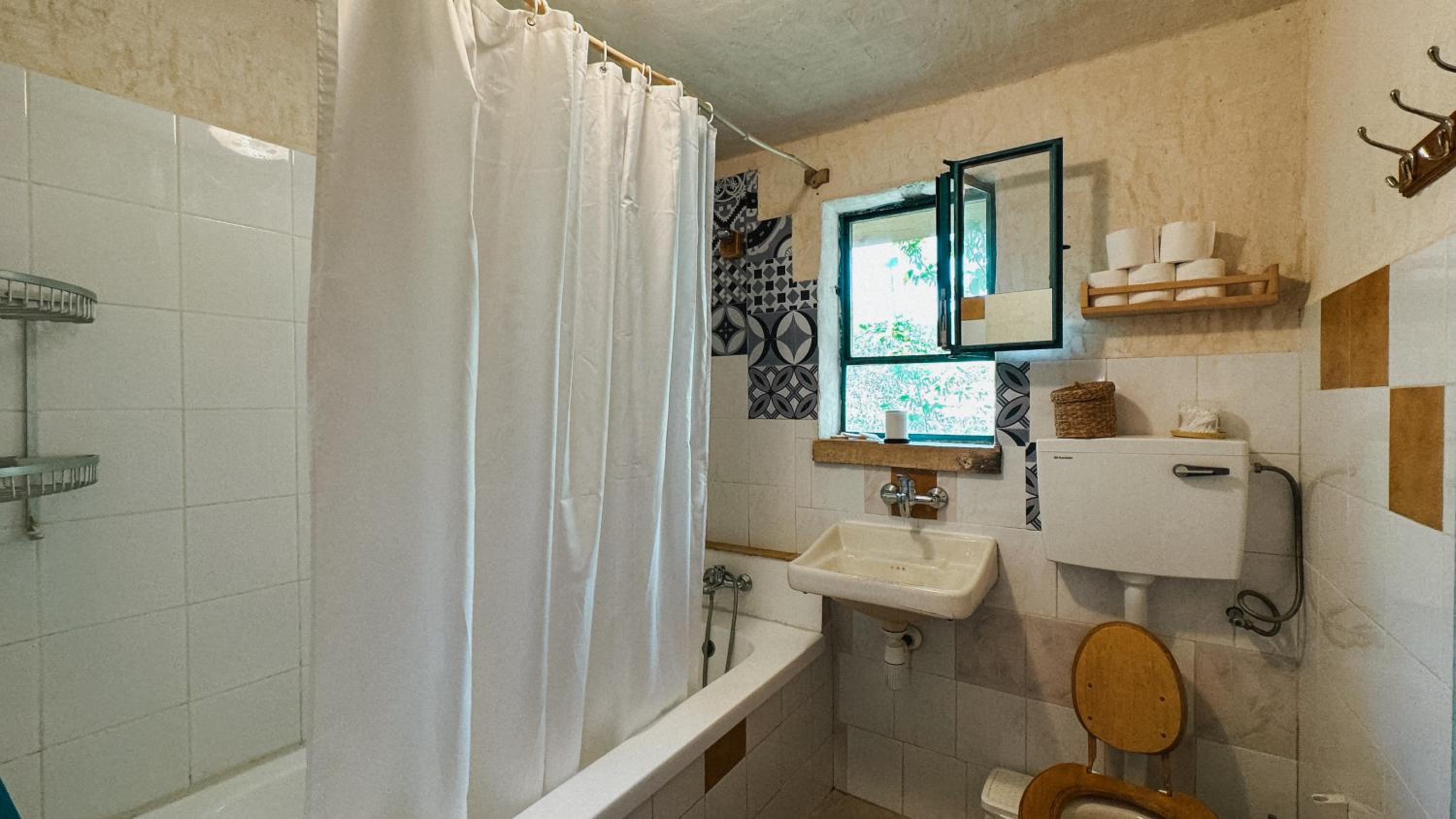 Three-Bedroom House - Photo 44