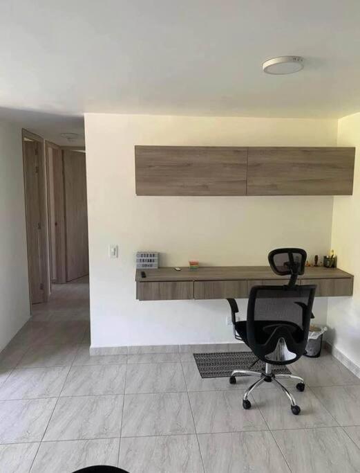 Three-Bedroom Apartment photo 1