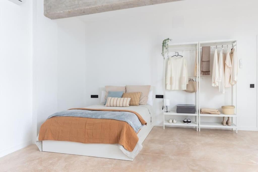 Estudio King con Sofá Cama