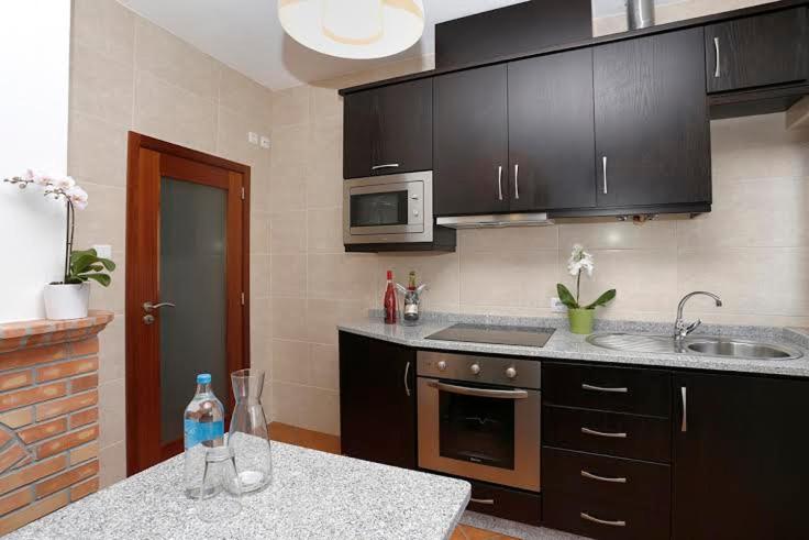Three-Bedroom House - Photo 4