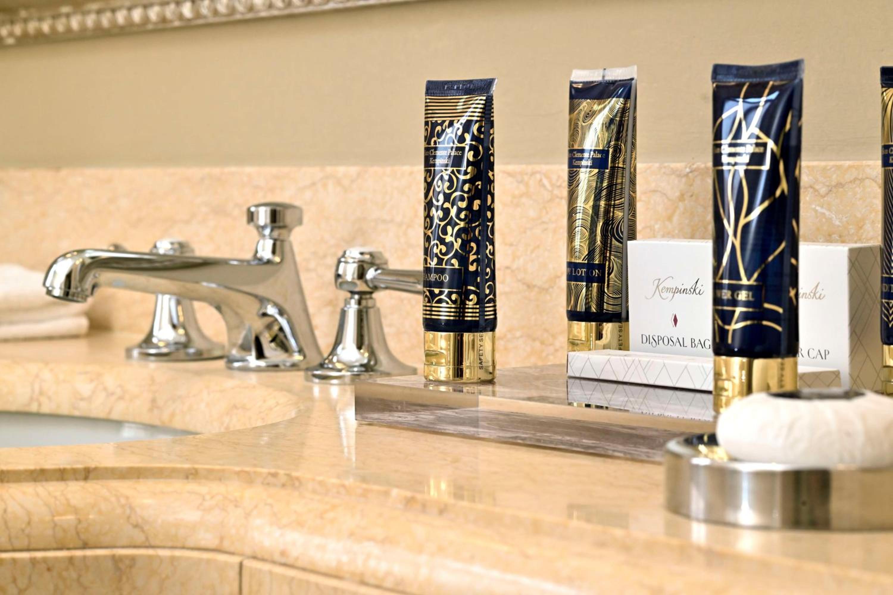 collection of skin care products on a marble countertop