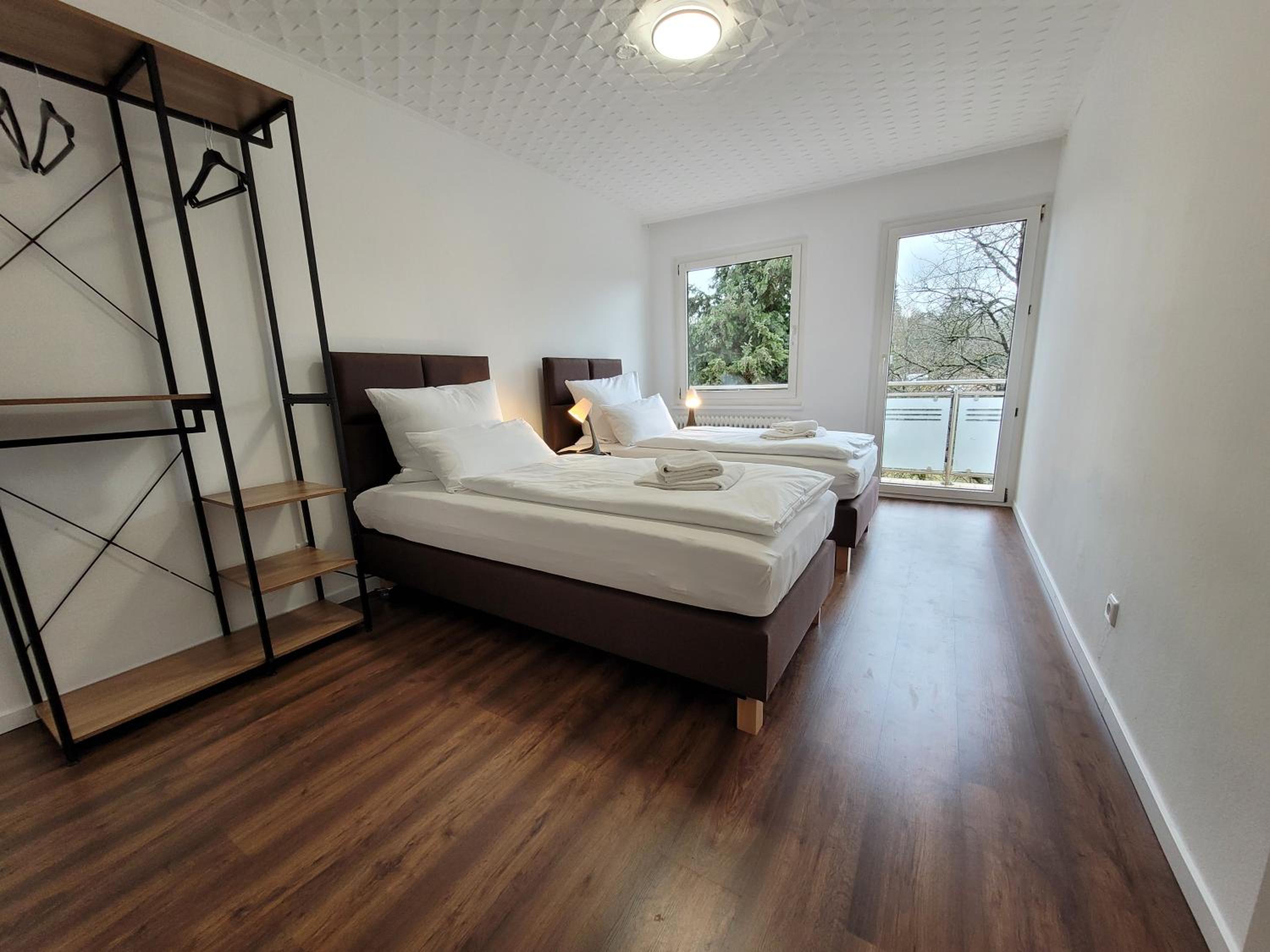 Four-Bedroom Apartment with Balcony  photo 1