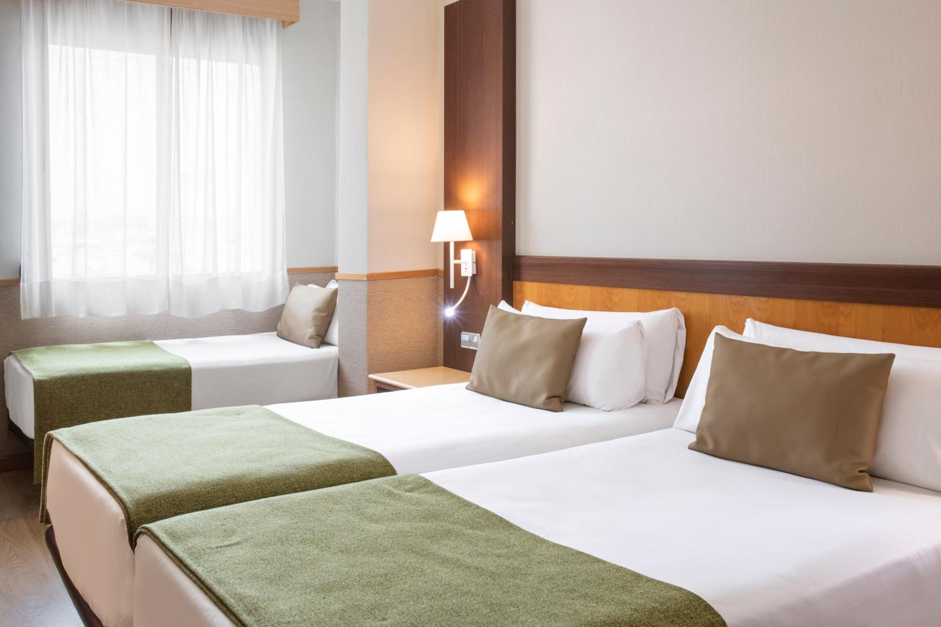 Triple Room - Photo 1