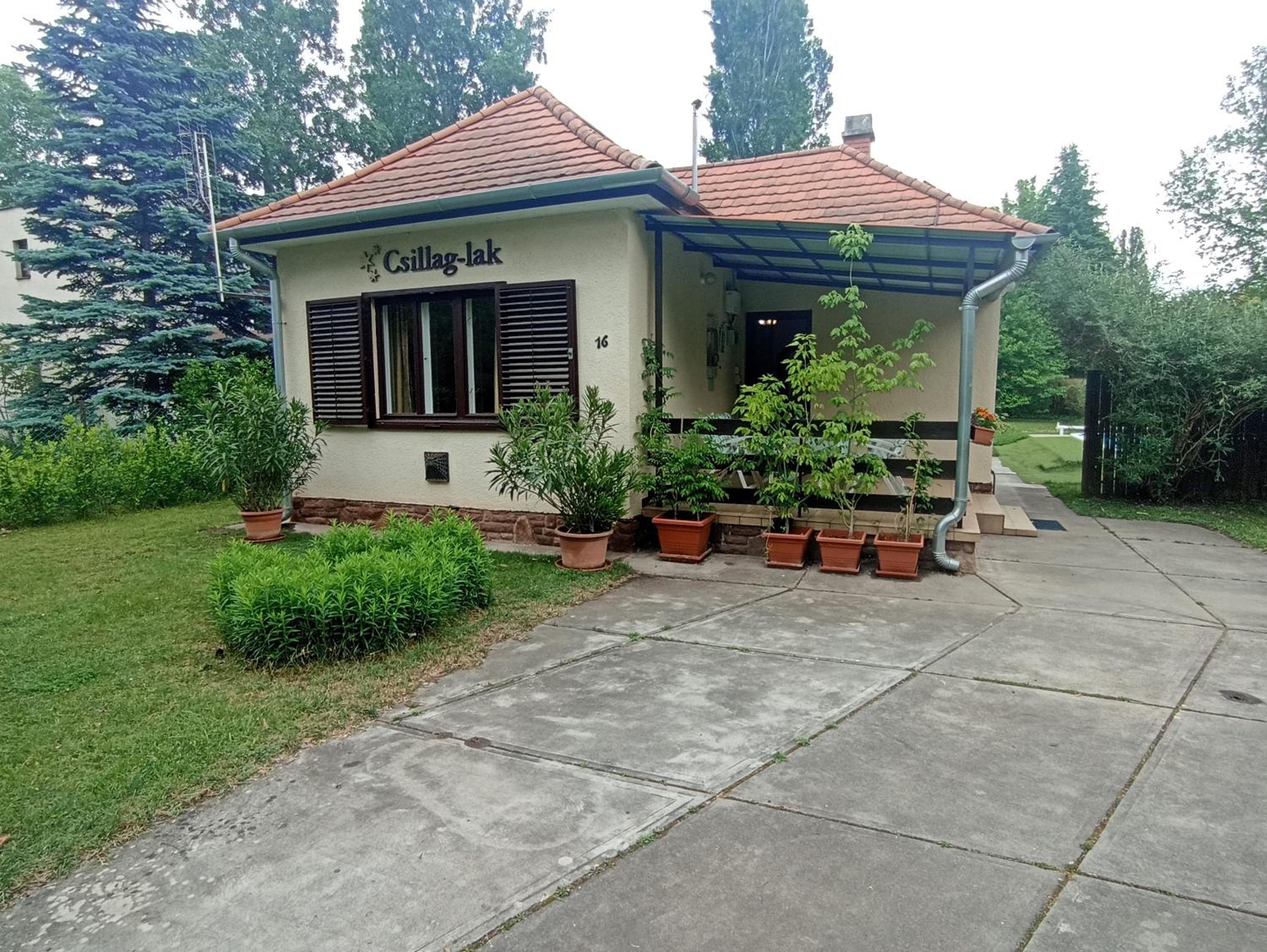 Three-Bedroom House - Photo 15