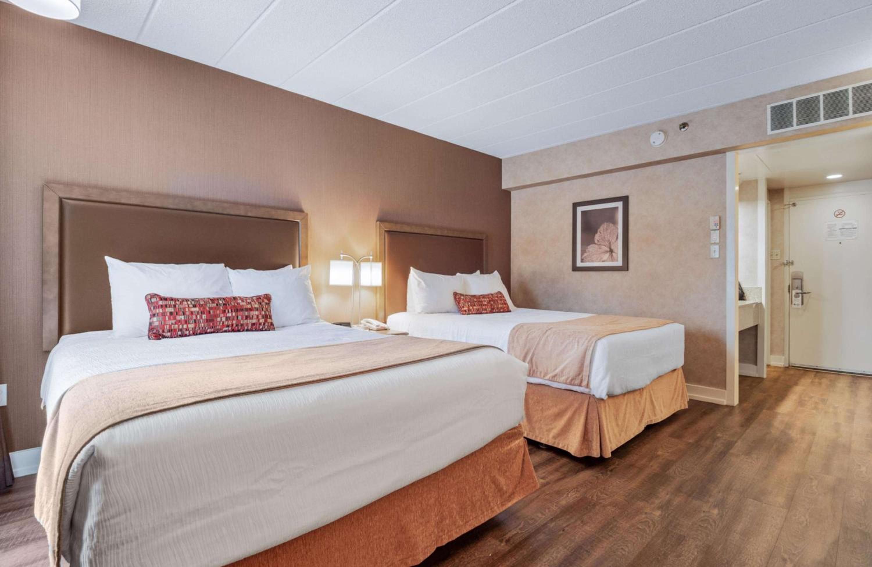 Corner Queen Room with Two Queen Beds - Non-Smoking - Photo 1