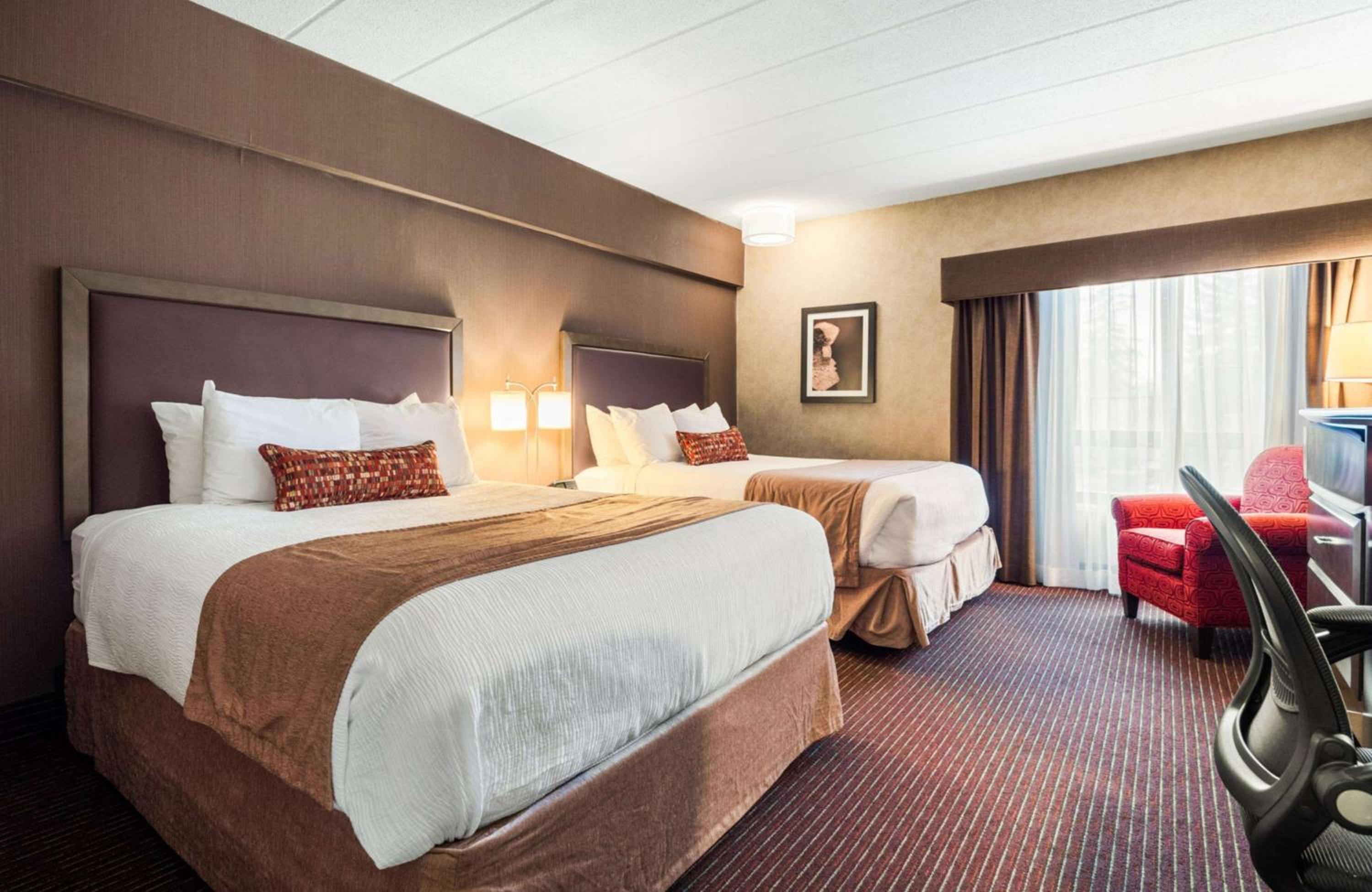Queen Room with Two Queen Beds - Photo 1