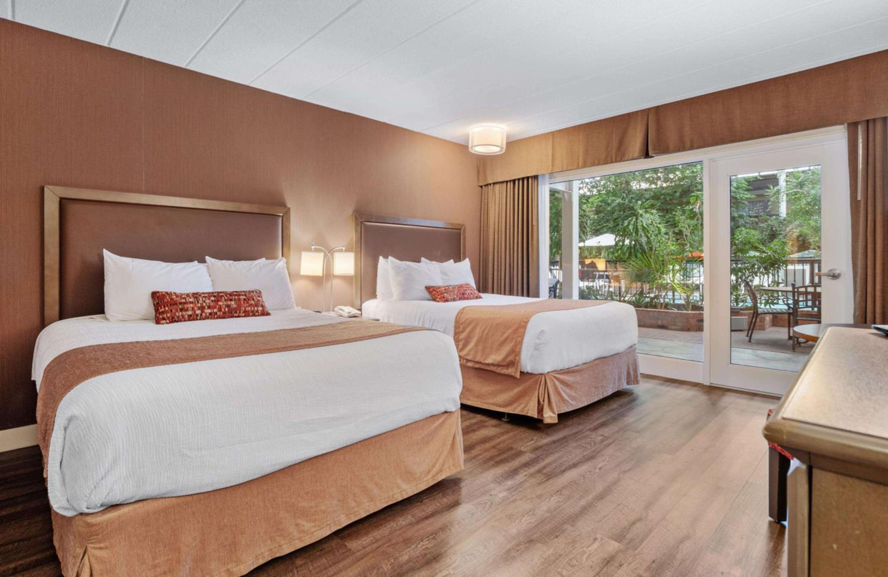 Queen Room with Two Queen Beds - Patio Access - Photo 1