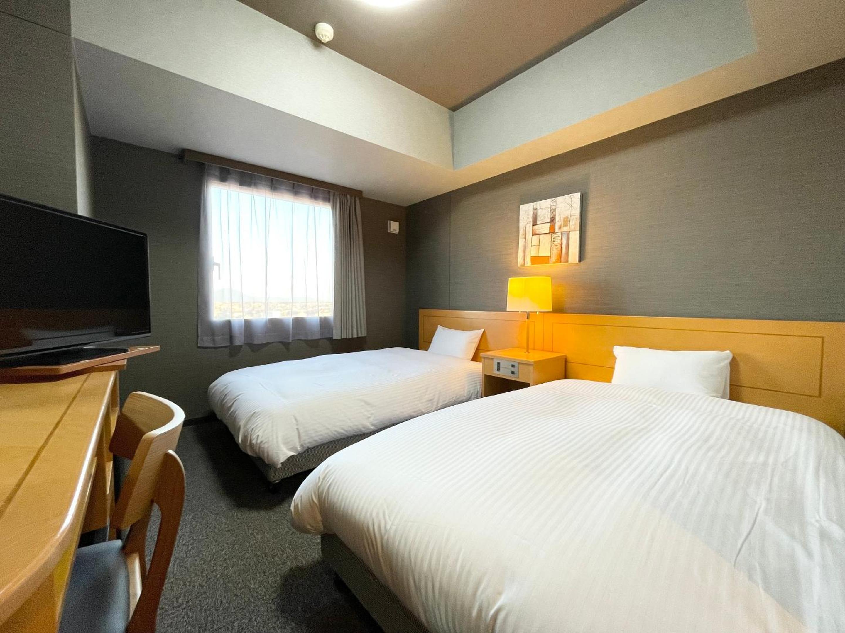 Twin Room - Non-Smoking - Photo 1
