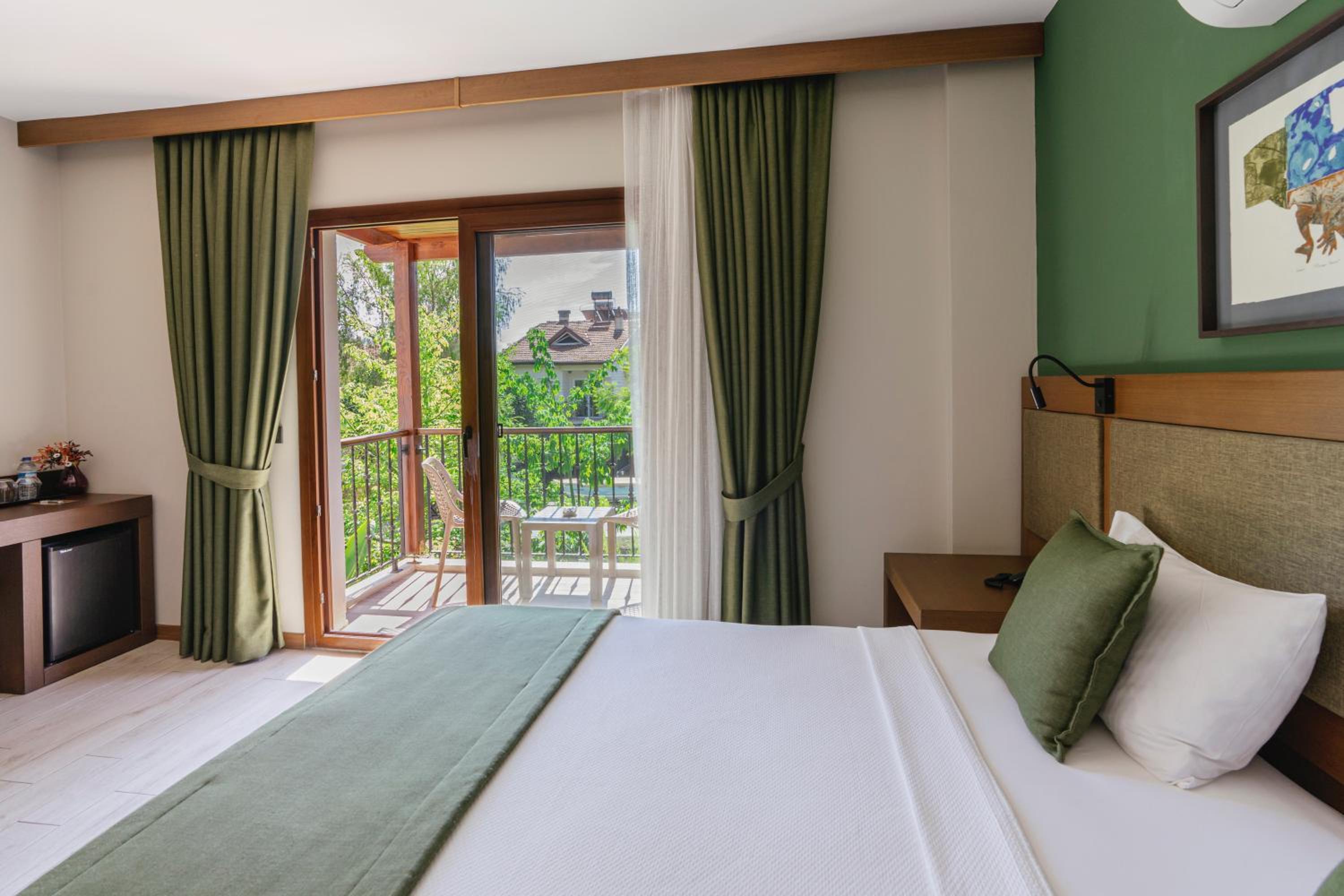 Deluxe Double Room with Balcony - Photo 1