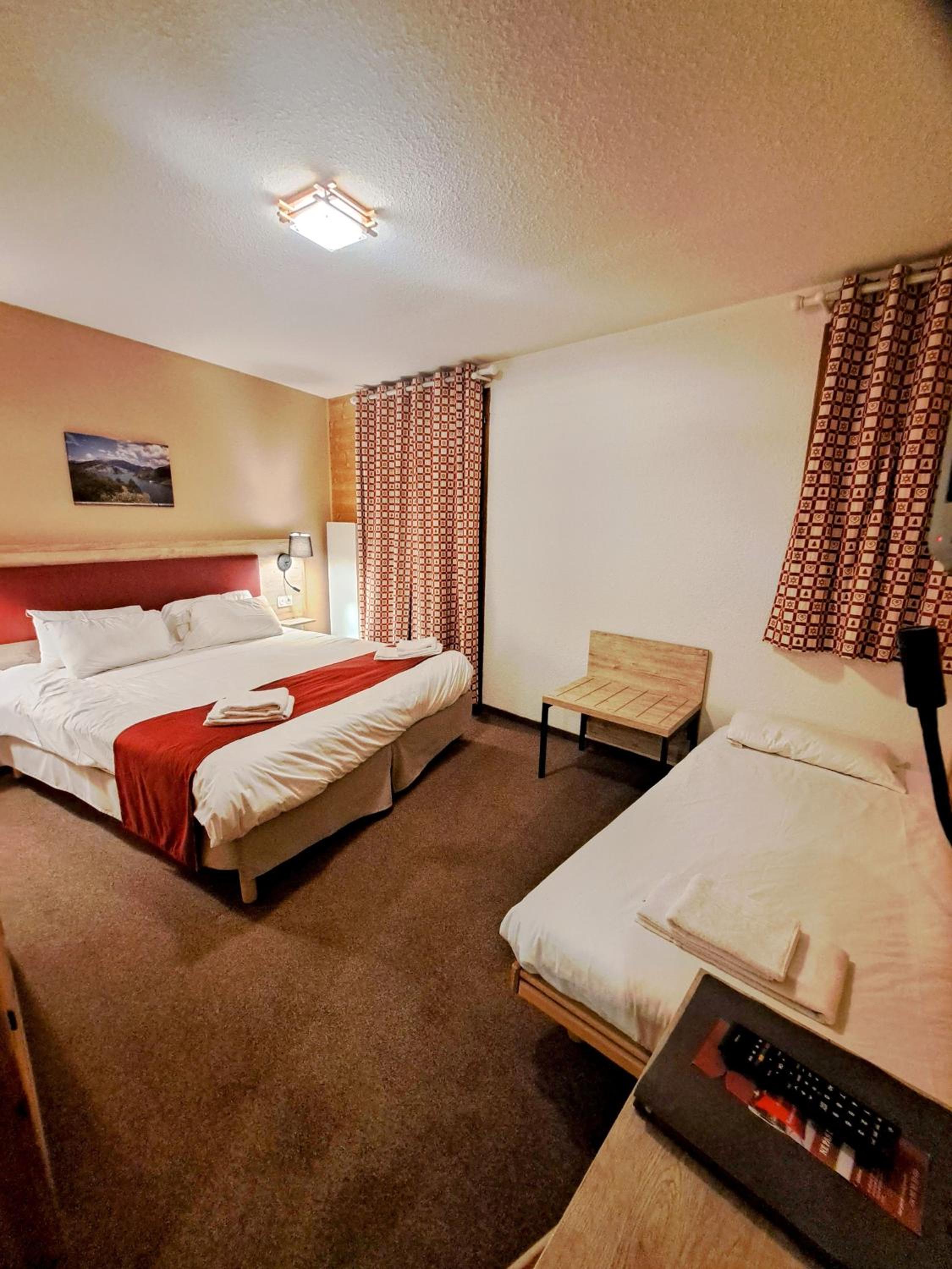 Chambre Triple – Vue sur Montagne