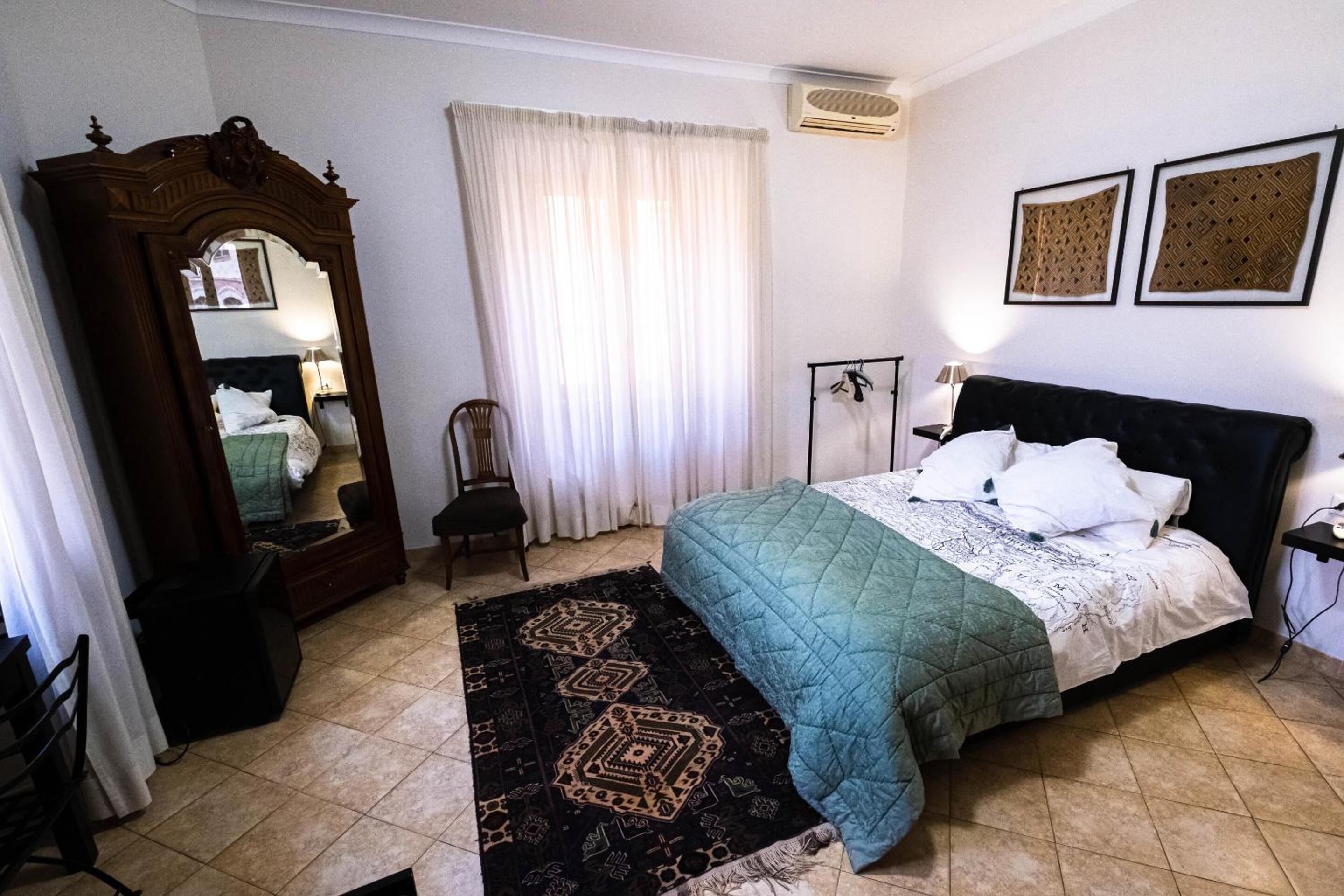 Quadruple Room with Private Bathroom photo 1