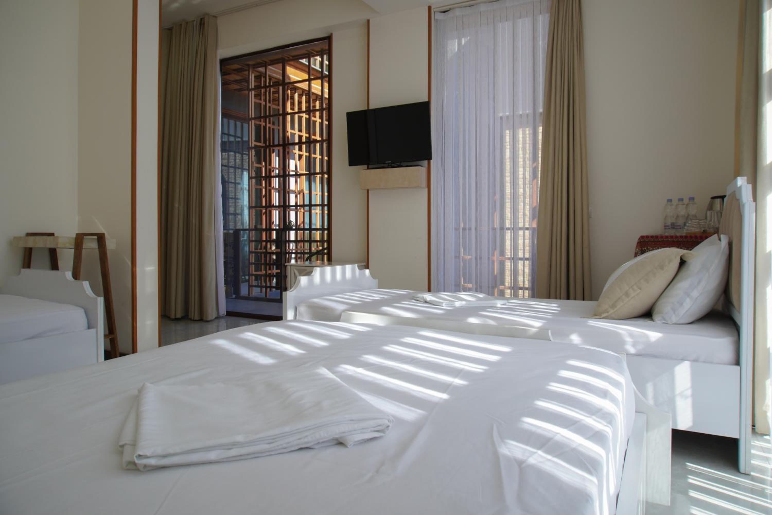 Quadruple Room with Balcony photo 1