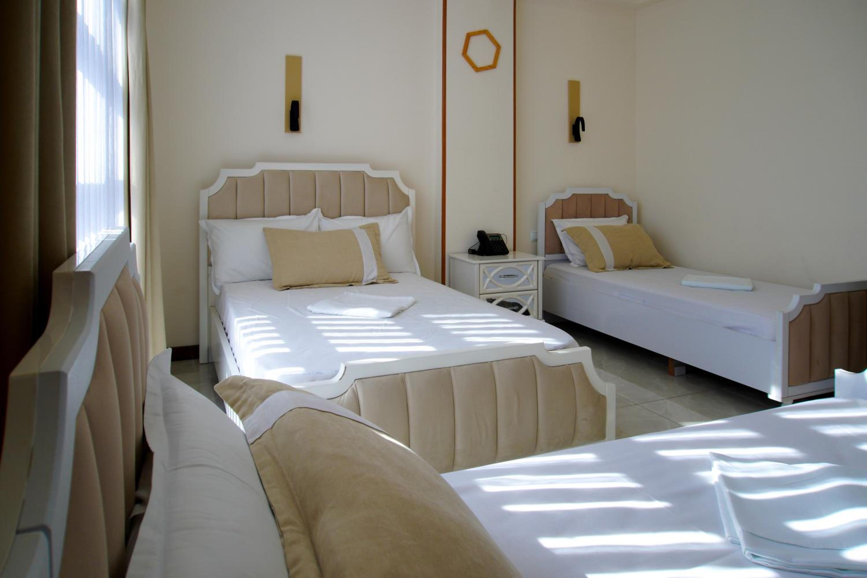 Quadruple Room with Balcony photo 3