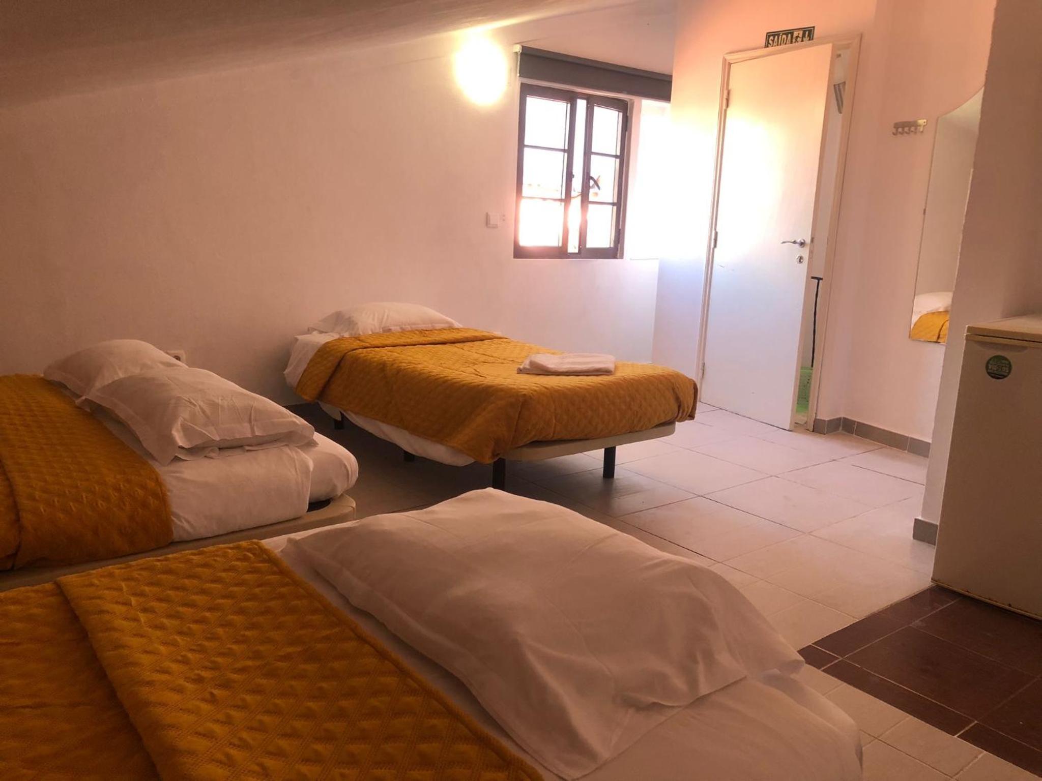 Quadruple Room with Private Bathroom photo 1