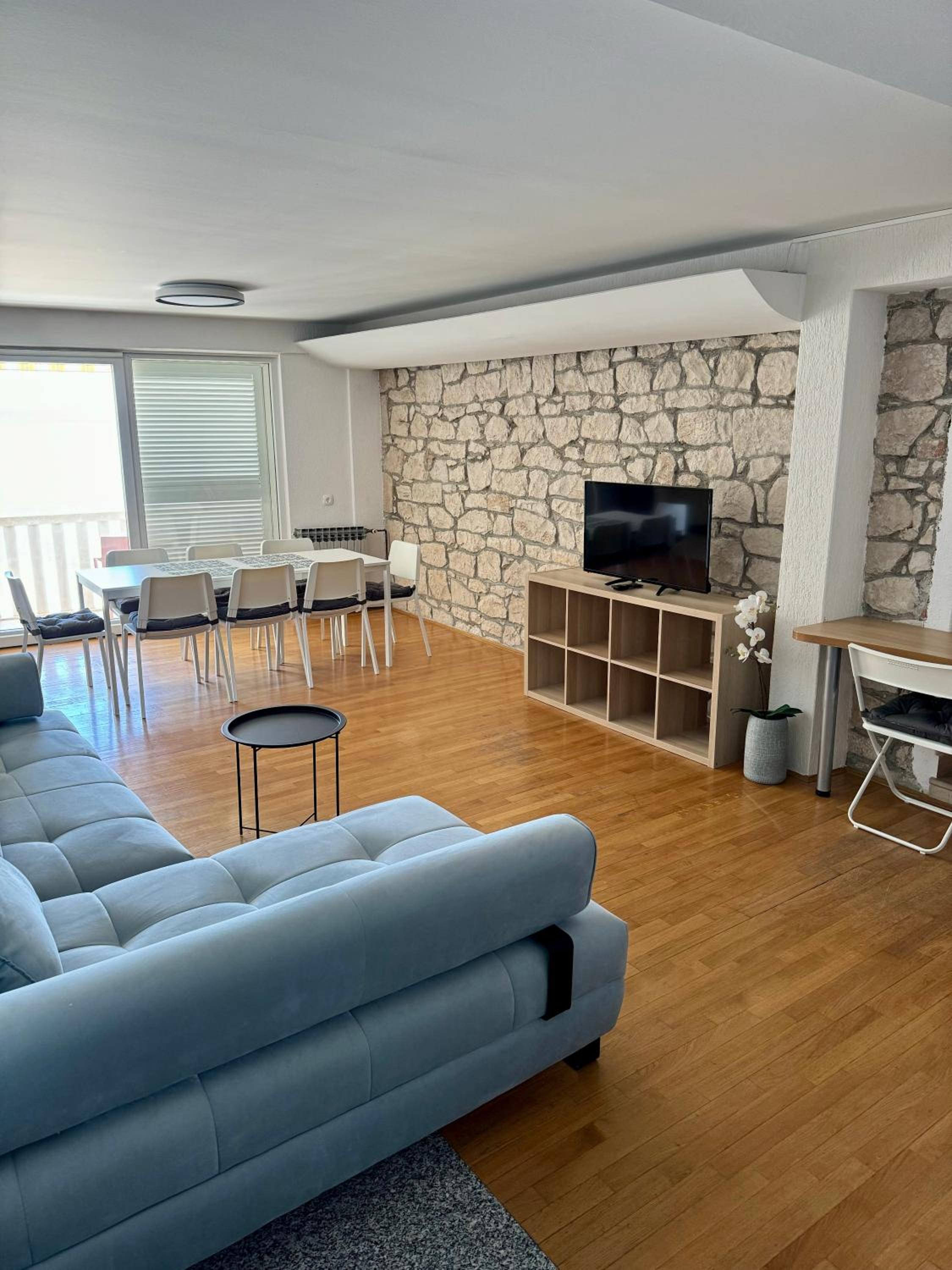 Three-Bedroom Apartment photo 1