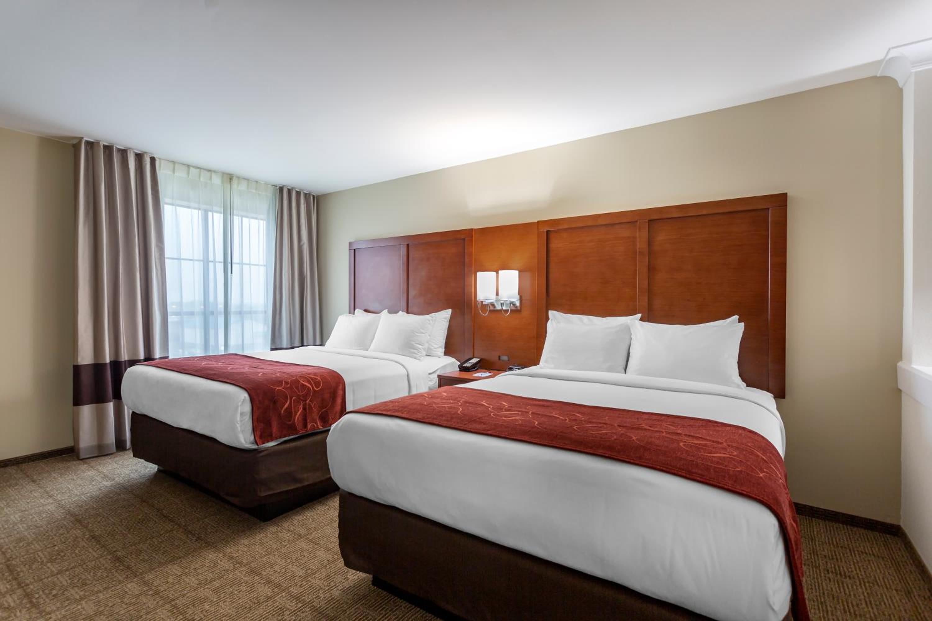 Standard Queen Suite with Two Queen Beds and Sofa Bed  photo 1