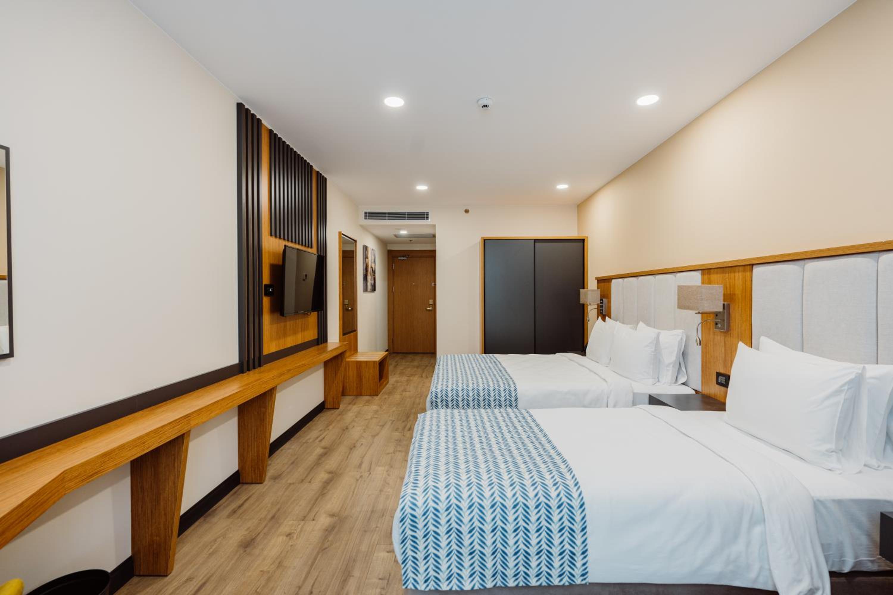 Deluxe Triple Room - Photo 1