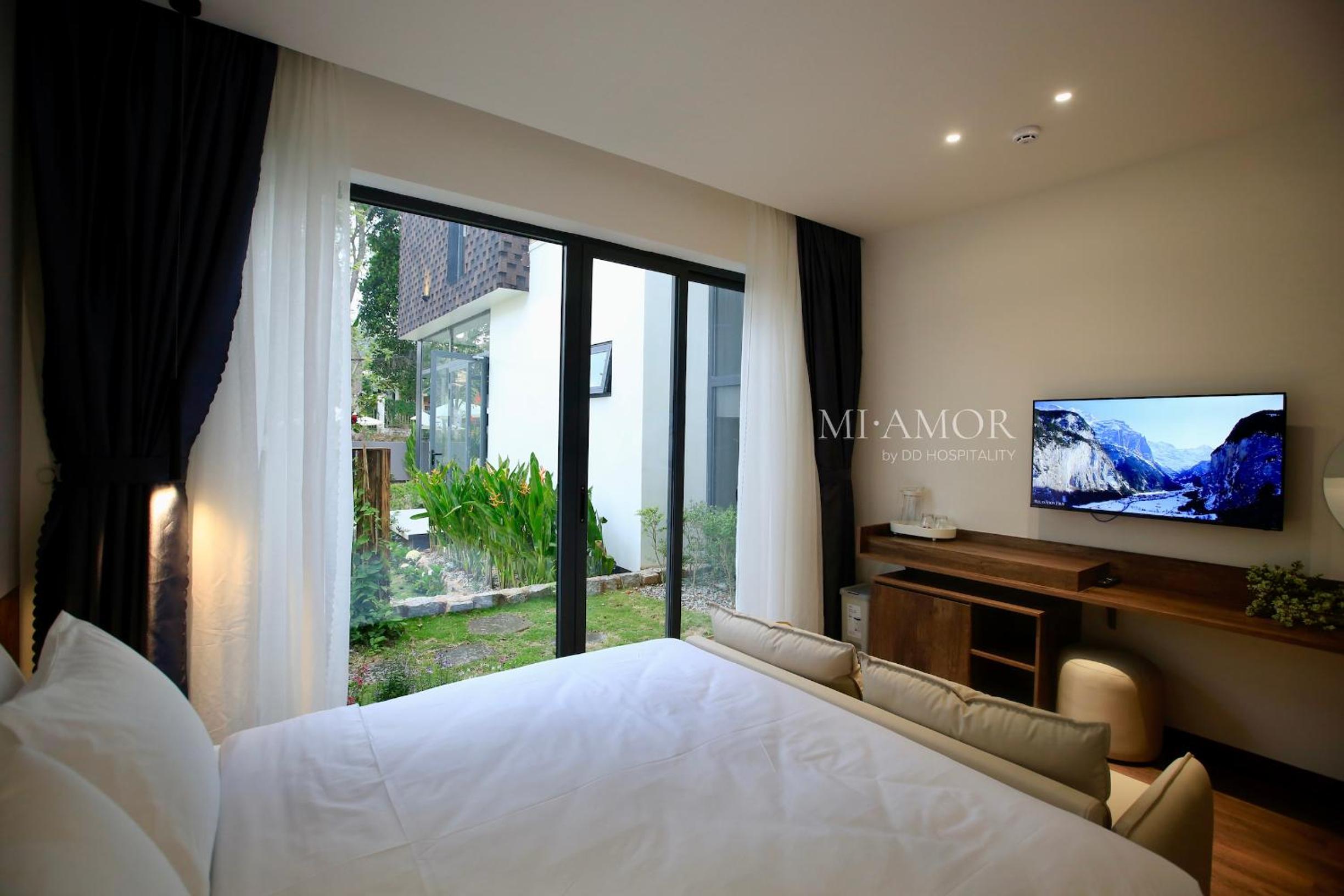Deluxe Queen Room - Photo 5