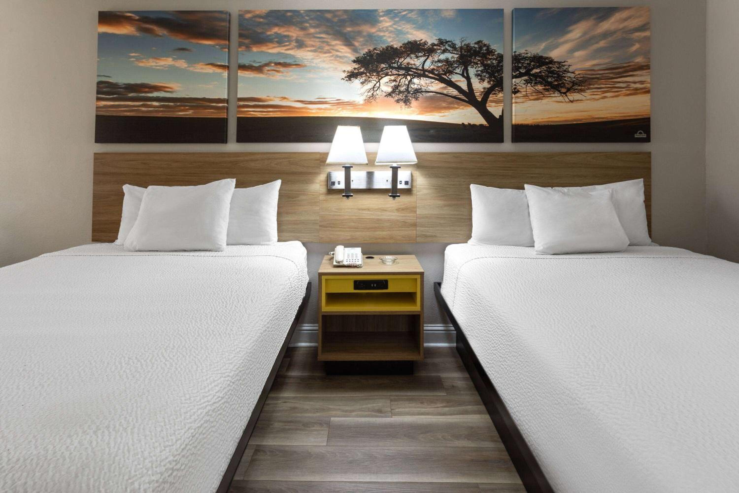 Queen Room with Two Queen Beds - Smoking - Photo 1