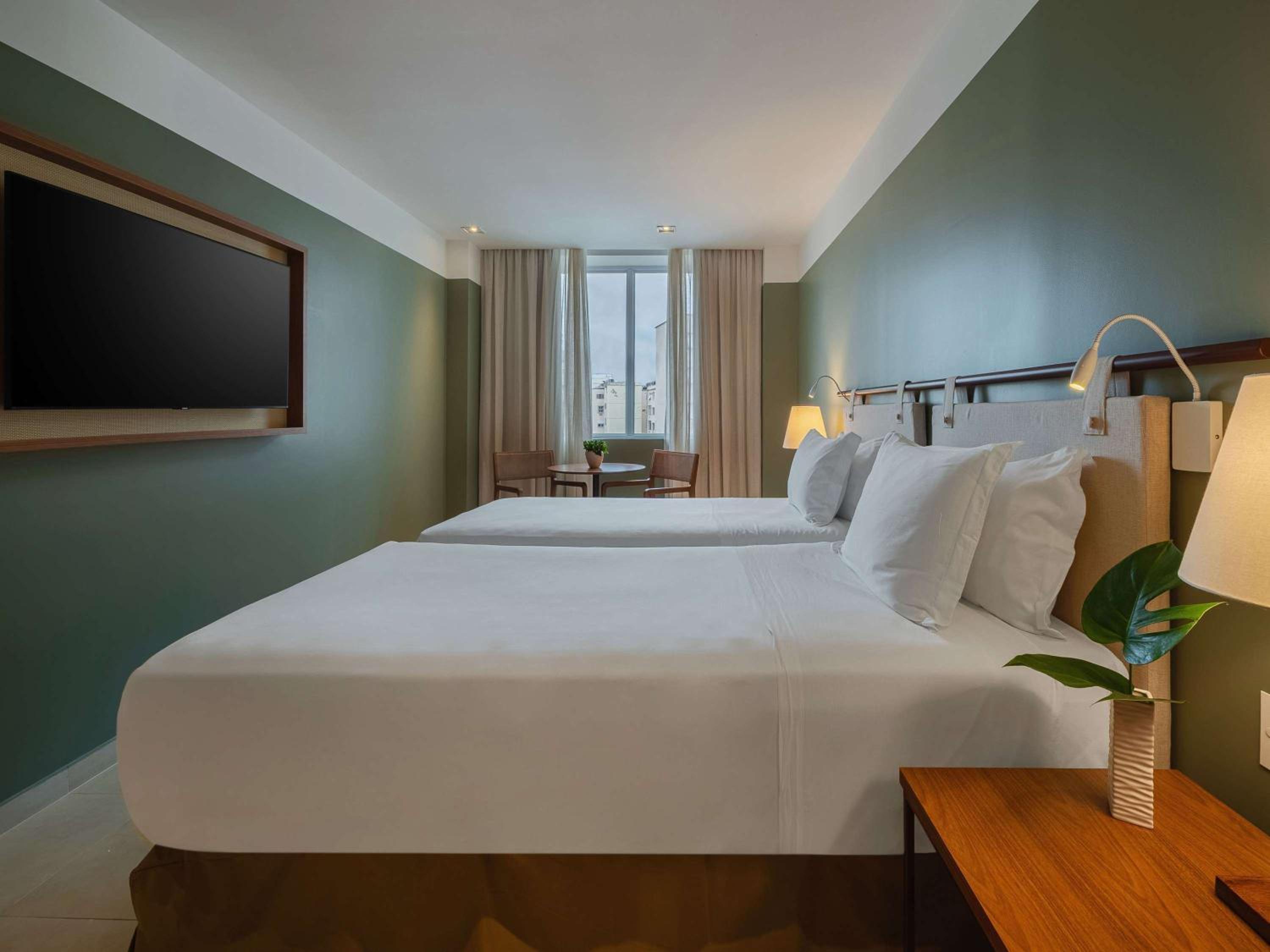 Deluxe Room with Two Single Beds and City View - Photo 6