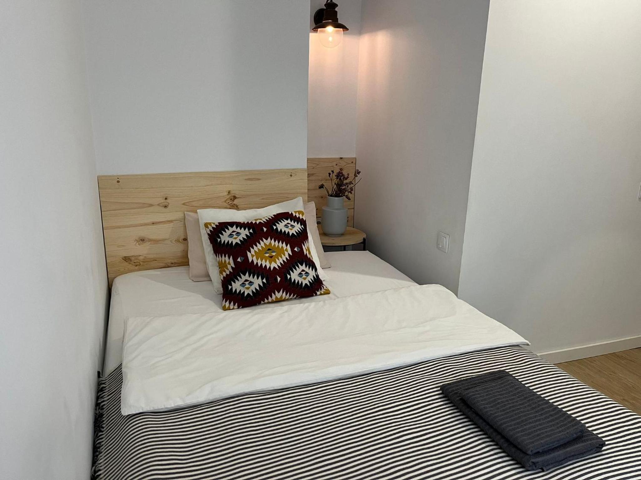 Habitación individual con baño compartido