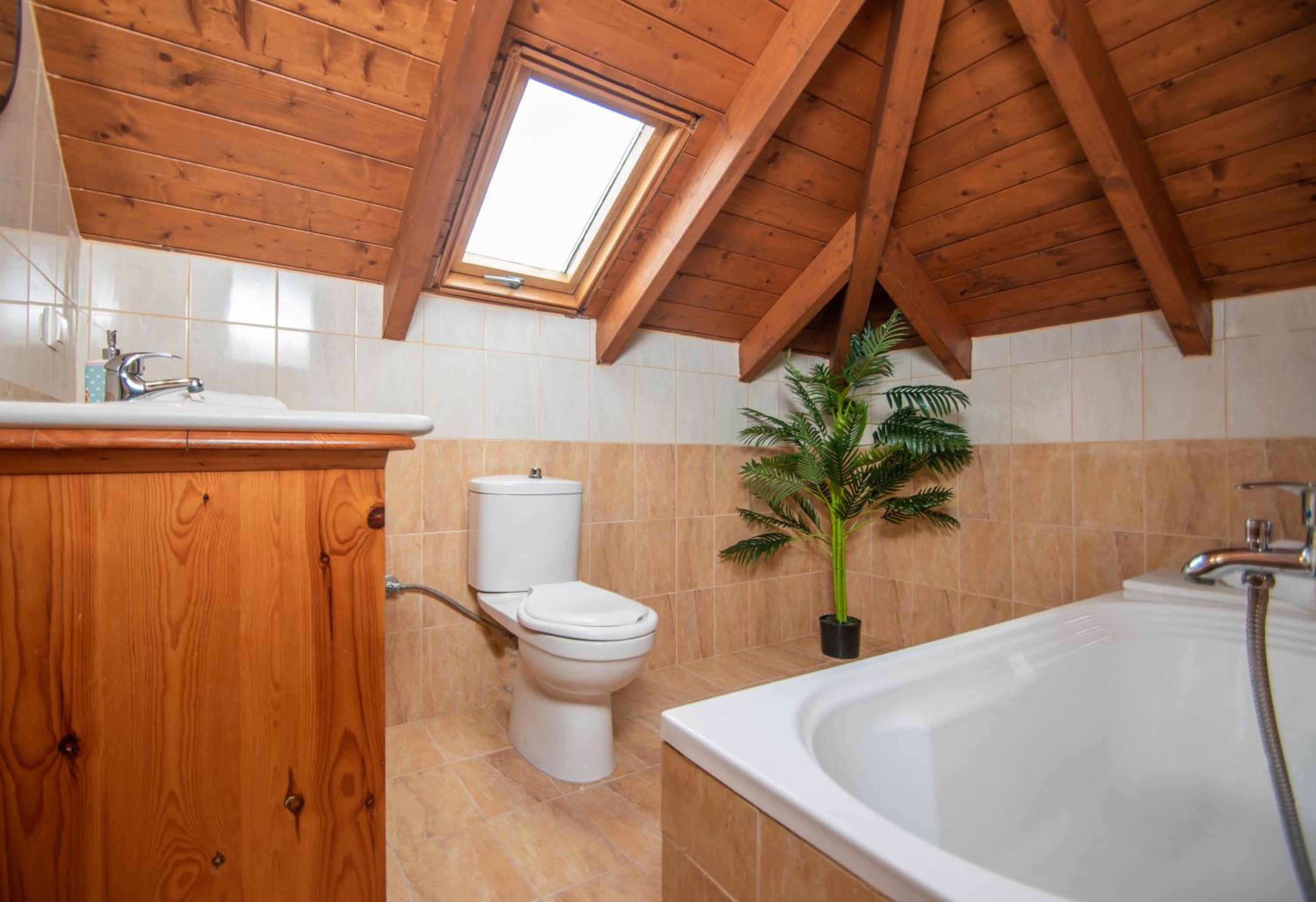 Three-Bedroom House - Photo 76