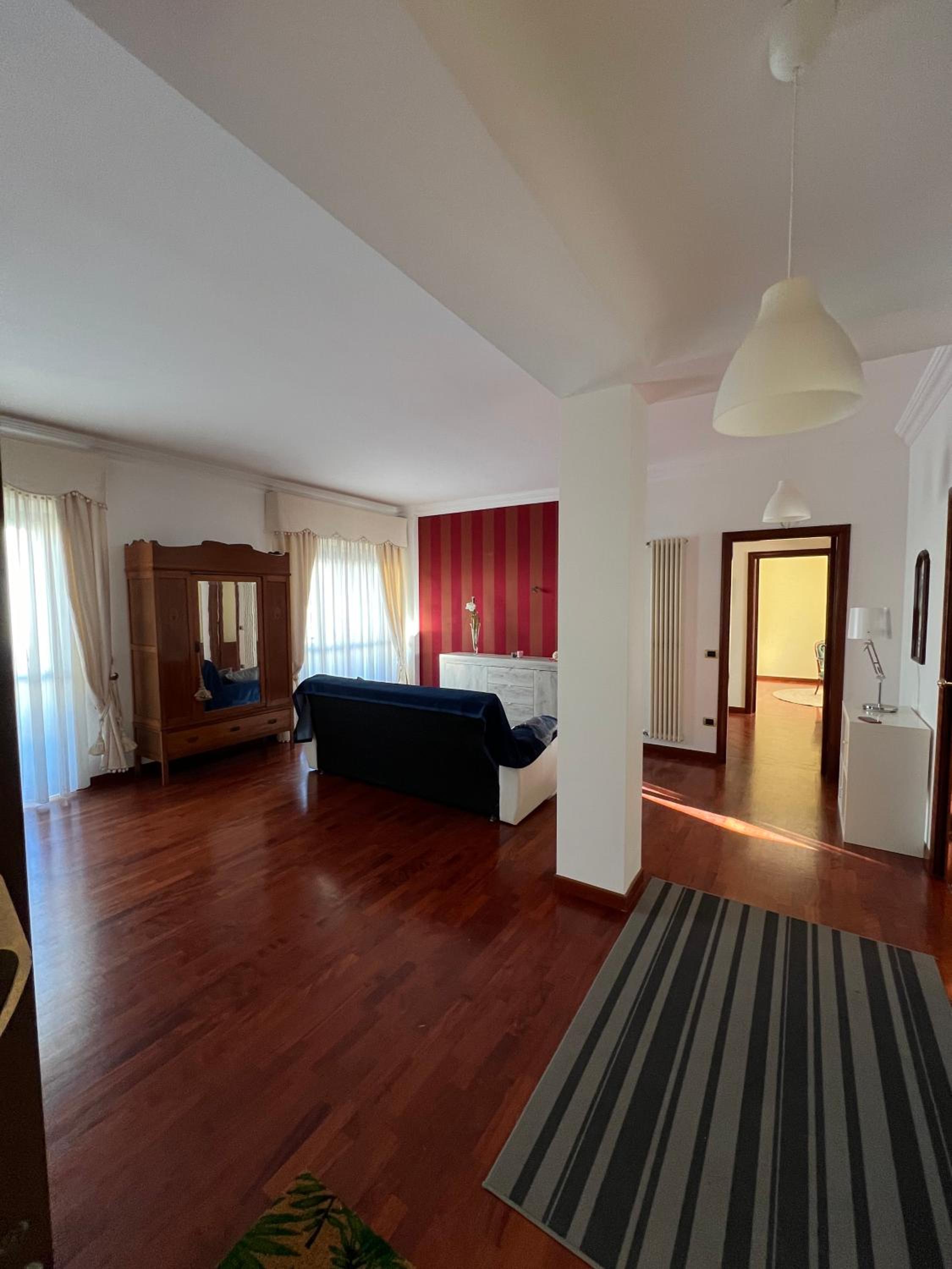 Three-Bedroom Apartment photo 1