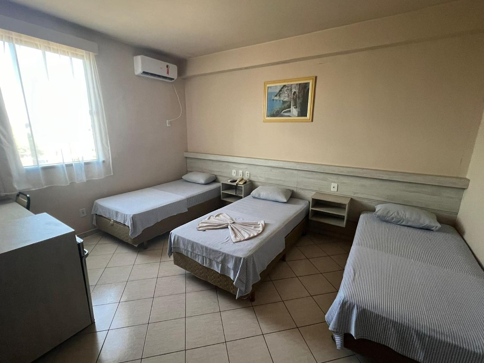 Basic Triple Room with Shared Bathroom photo 1