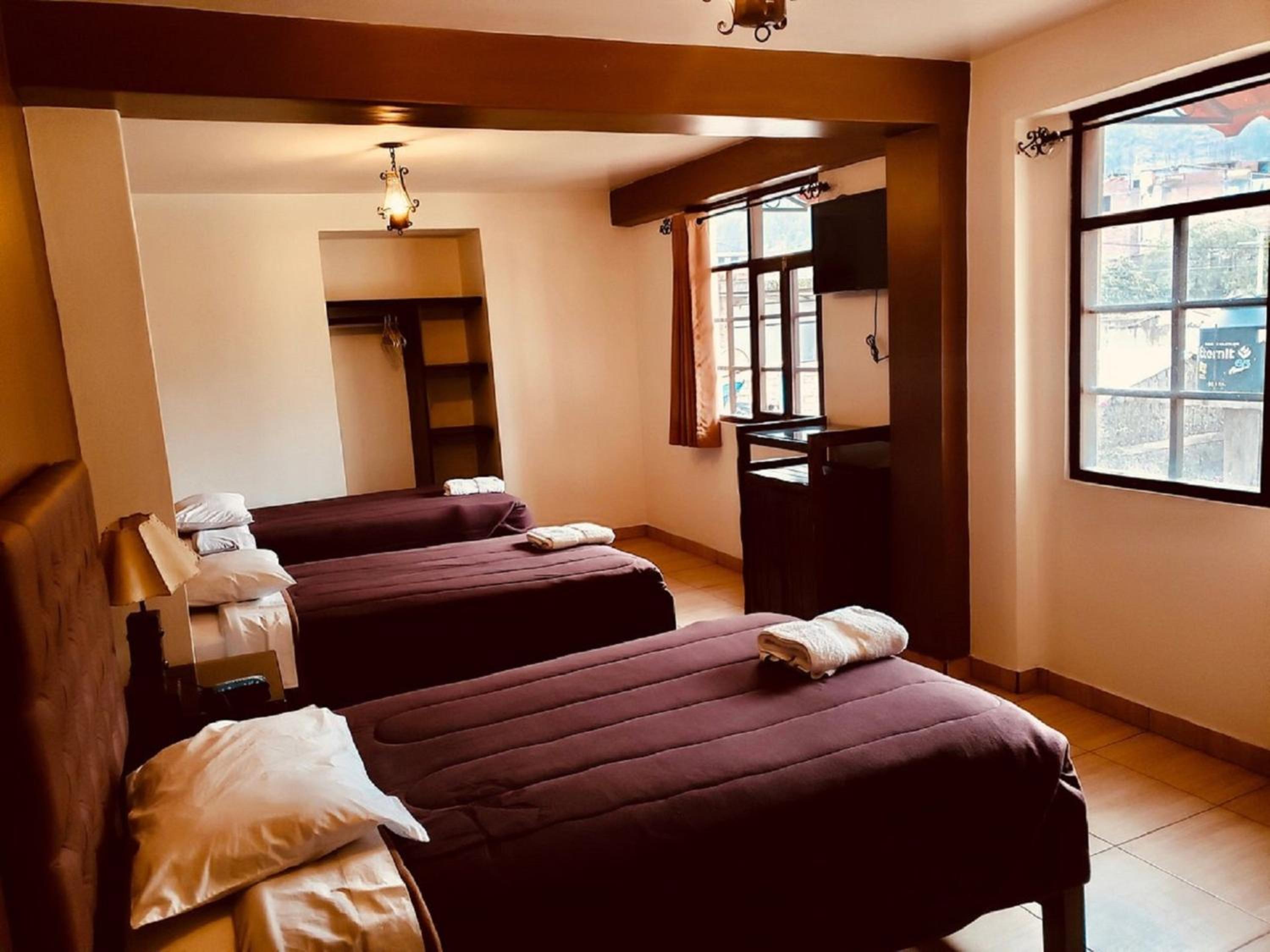 Triple Room with Private Bathroom photo 3