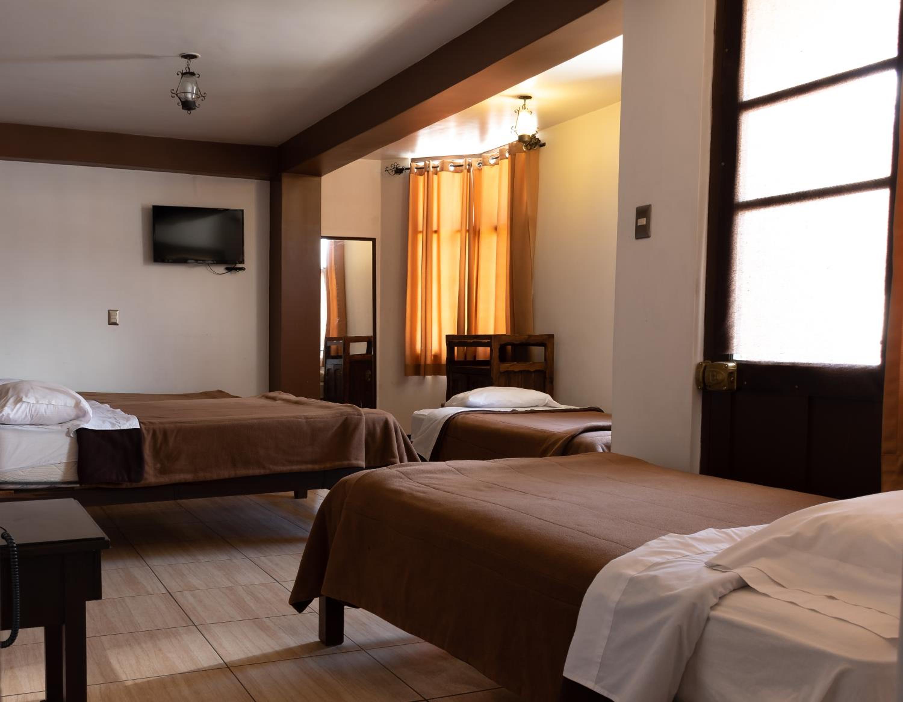 Quadruple Room with Private Bathroom photo 2