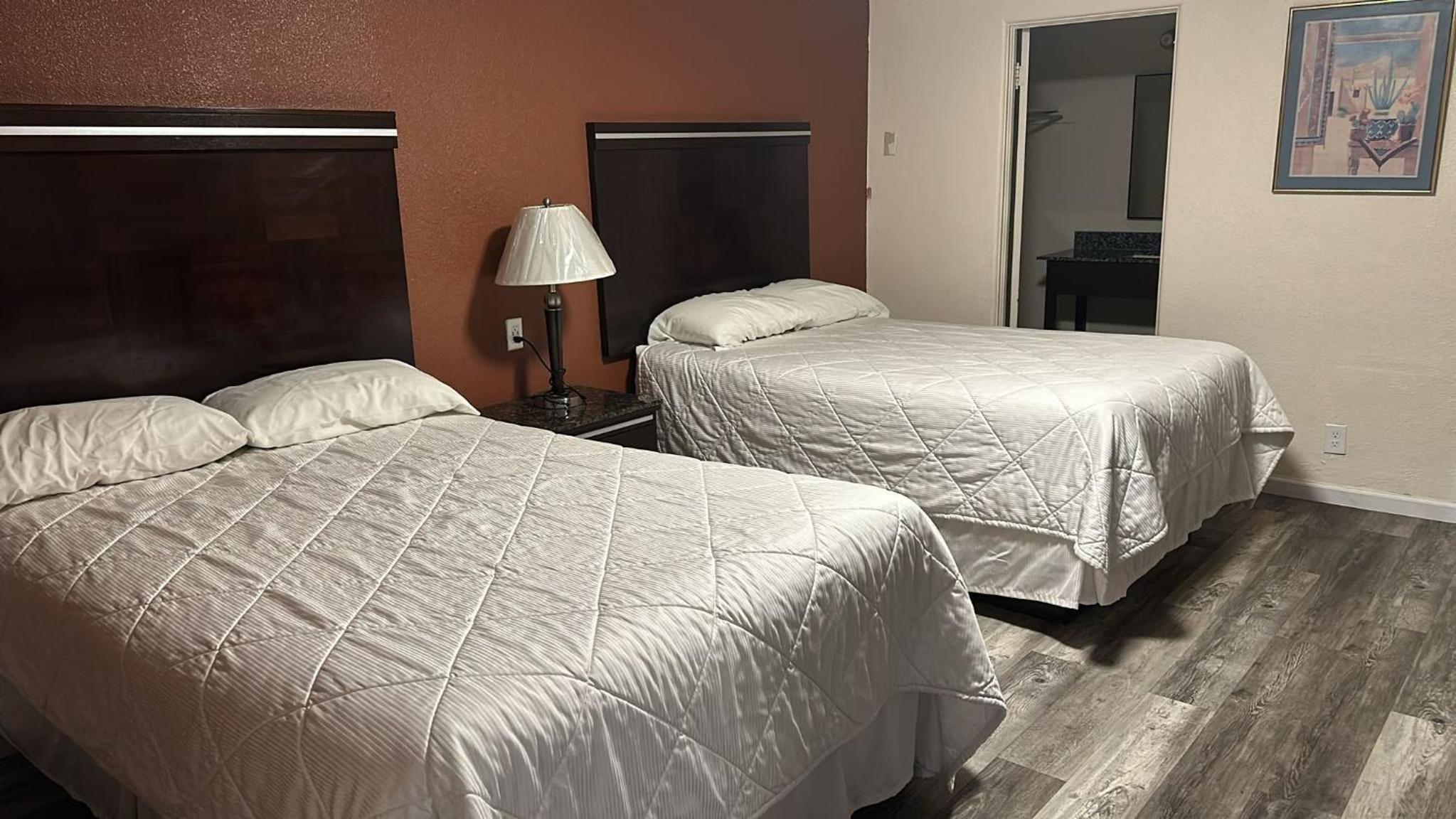 Queen Room with Two Queen Beds - Smoking photo 1