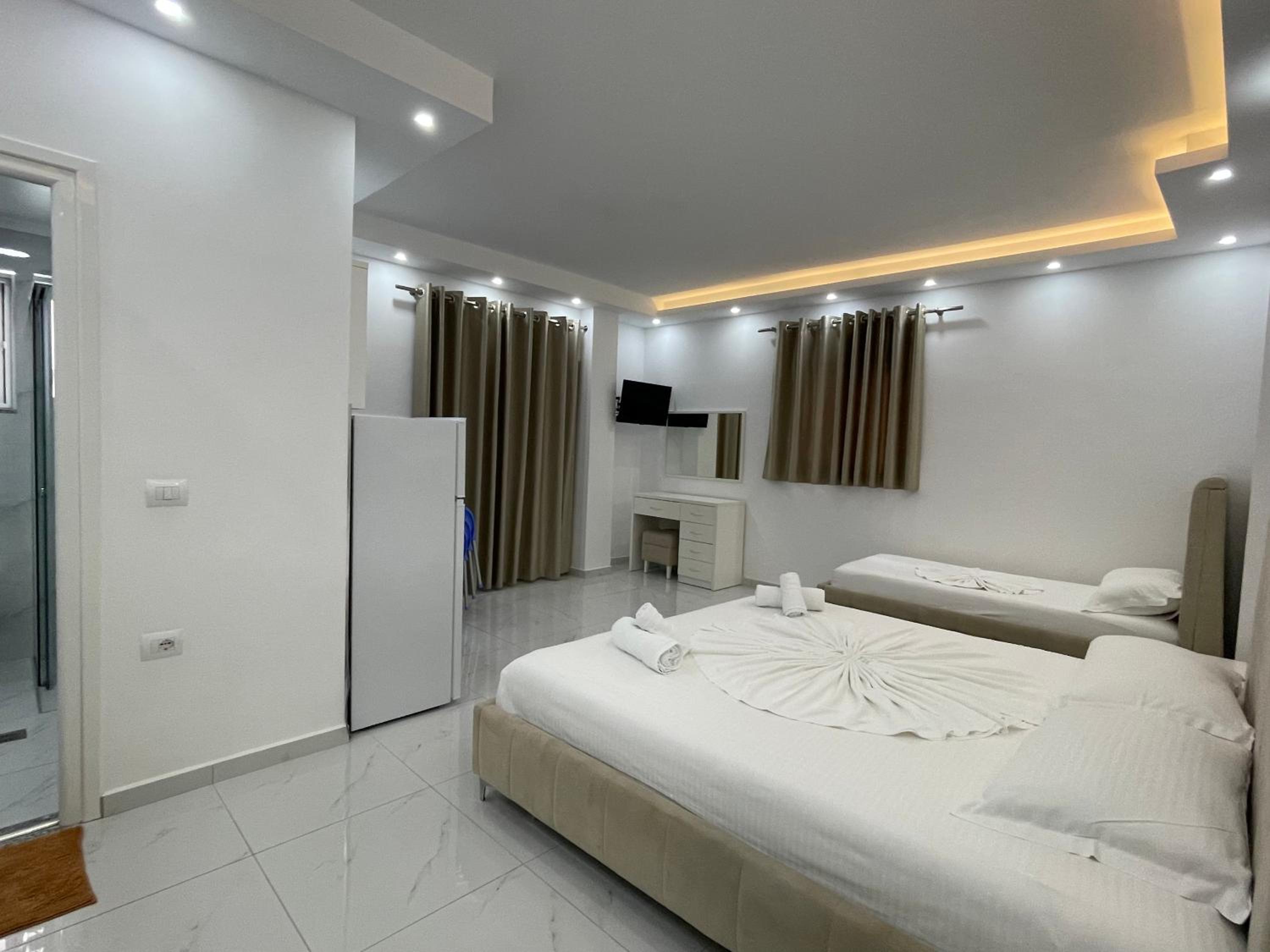 Superior Quadruple Room with Side Sea View