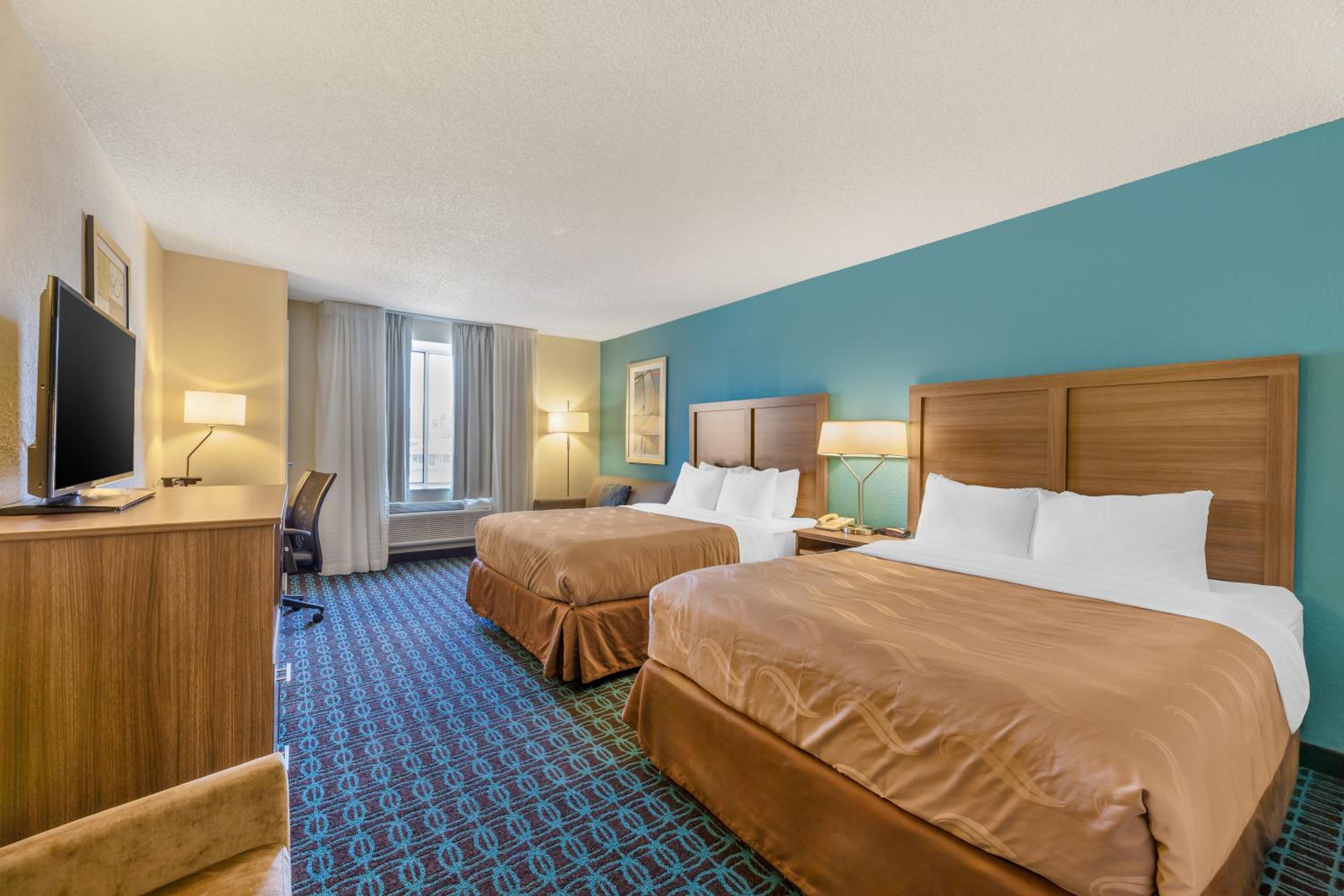 Queen Suite with Two Queen Beds and Sofa - Non Smoking - Photo 1